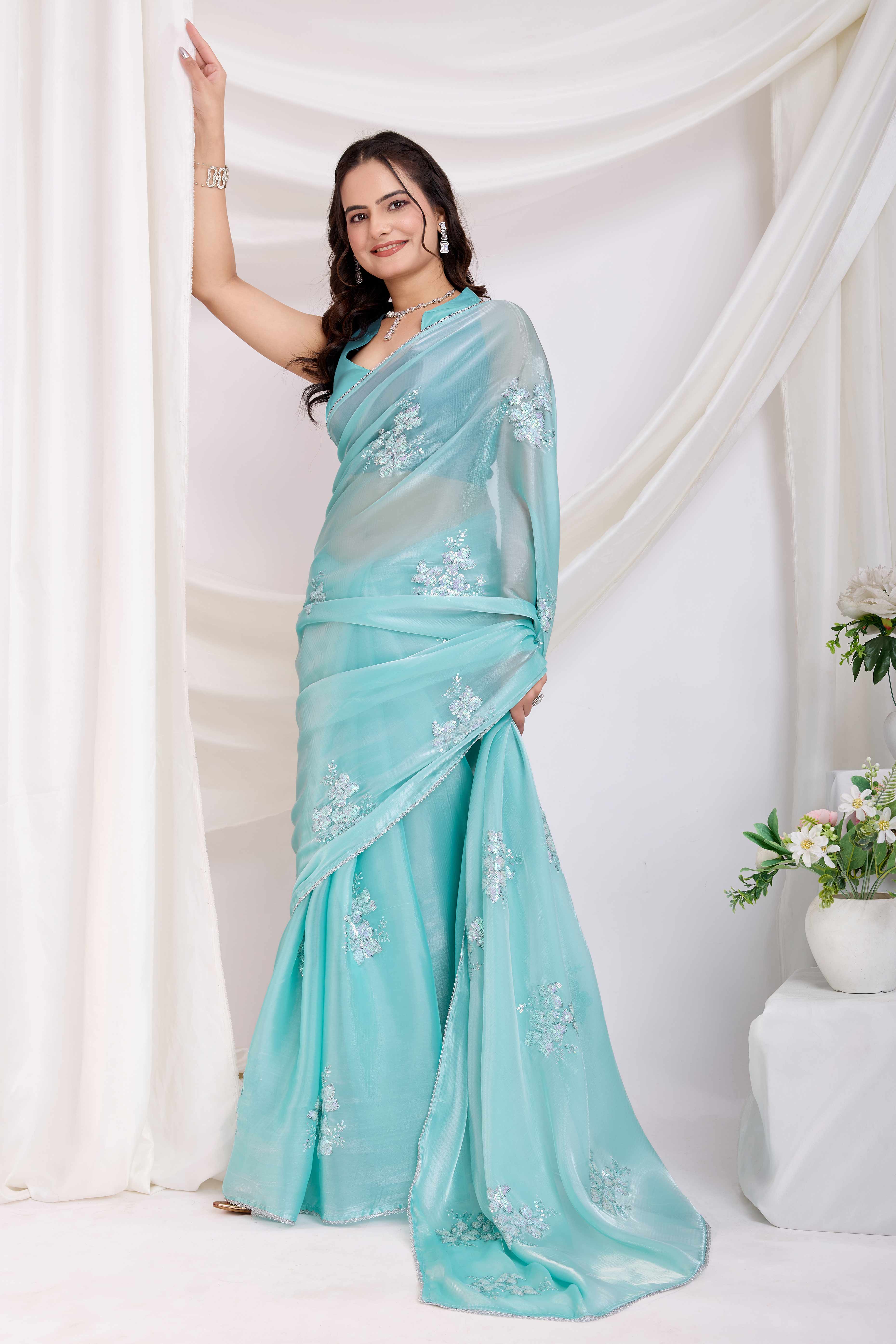 Turquoise Saree With Exquisite Floral Sequins Embroidery On Luxe Jimmy Choo Silk Blend