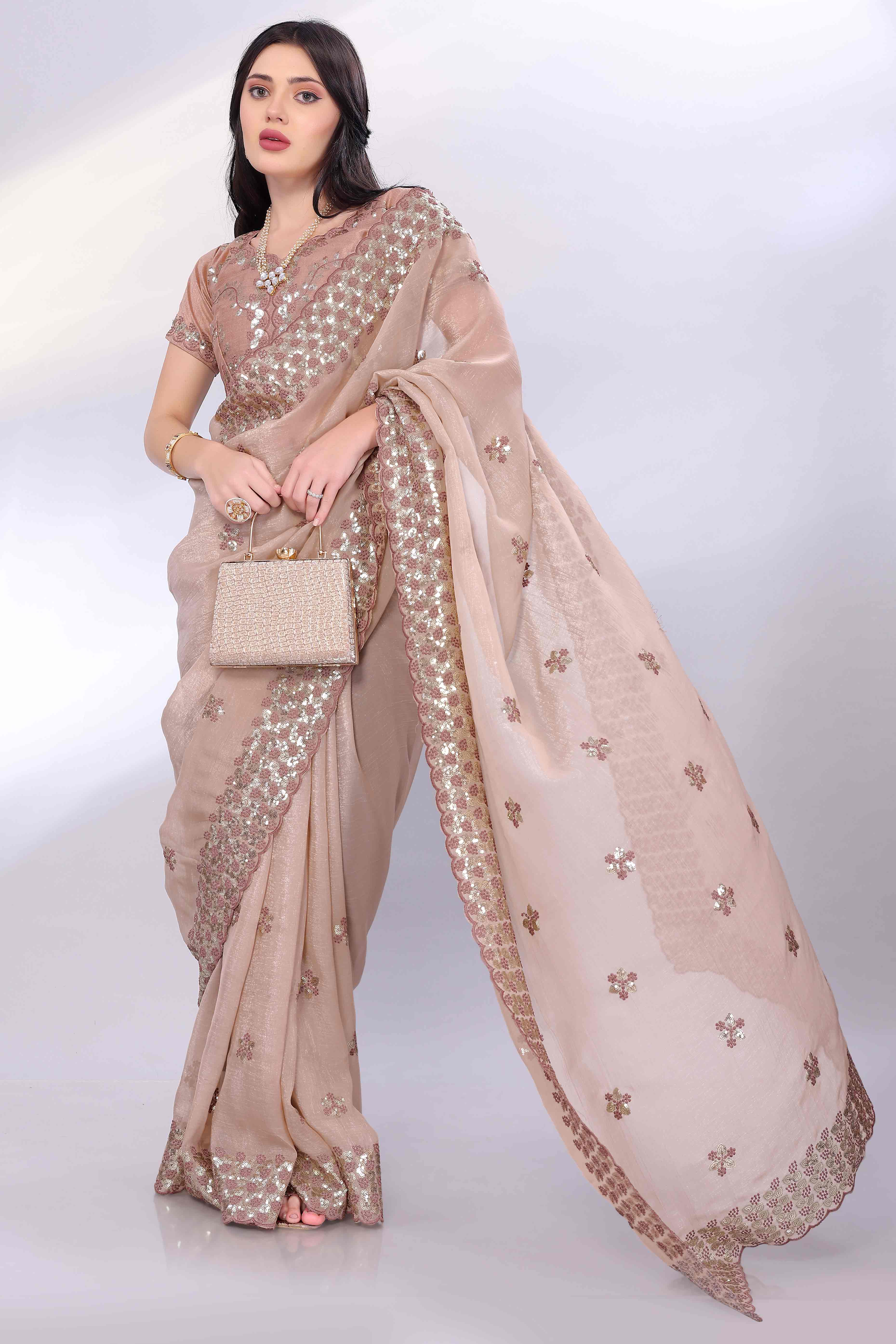 Beige Crunchy Organza Silk Saree Adorned With Intricate Floral Sequins Embroidery