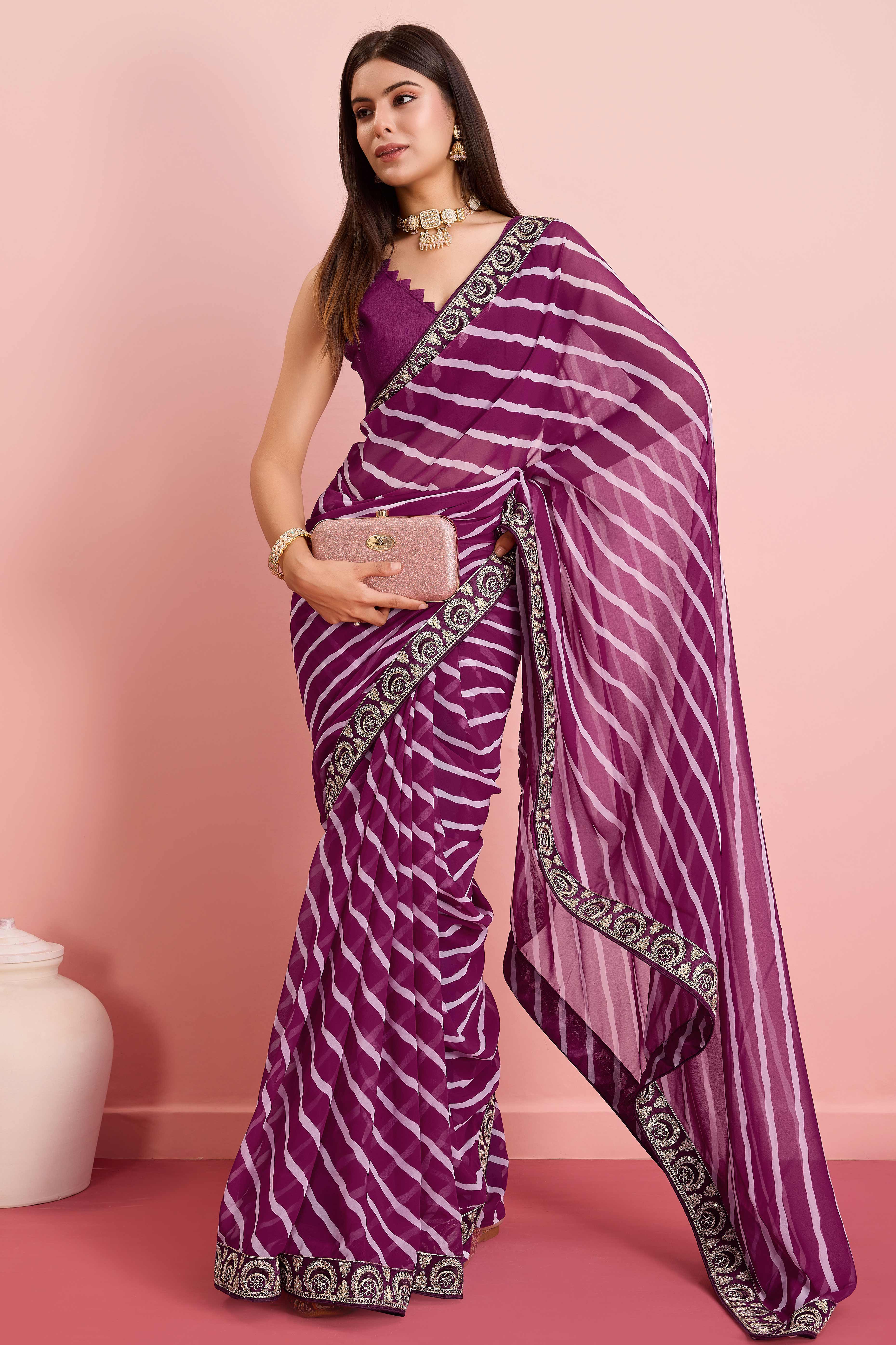Elegant Purple Leheriya Printed Saree in Flowing Georgette
