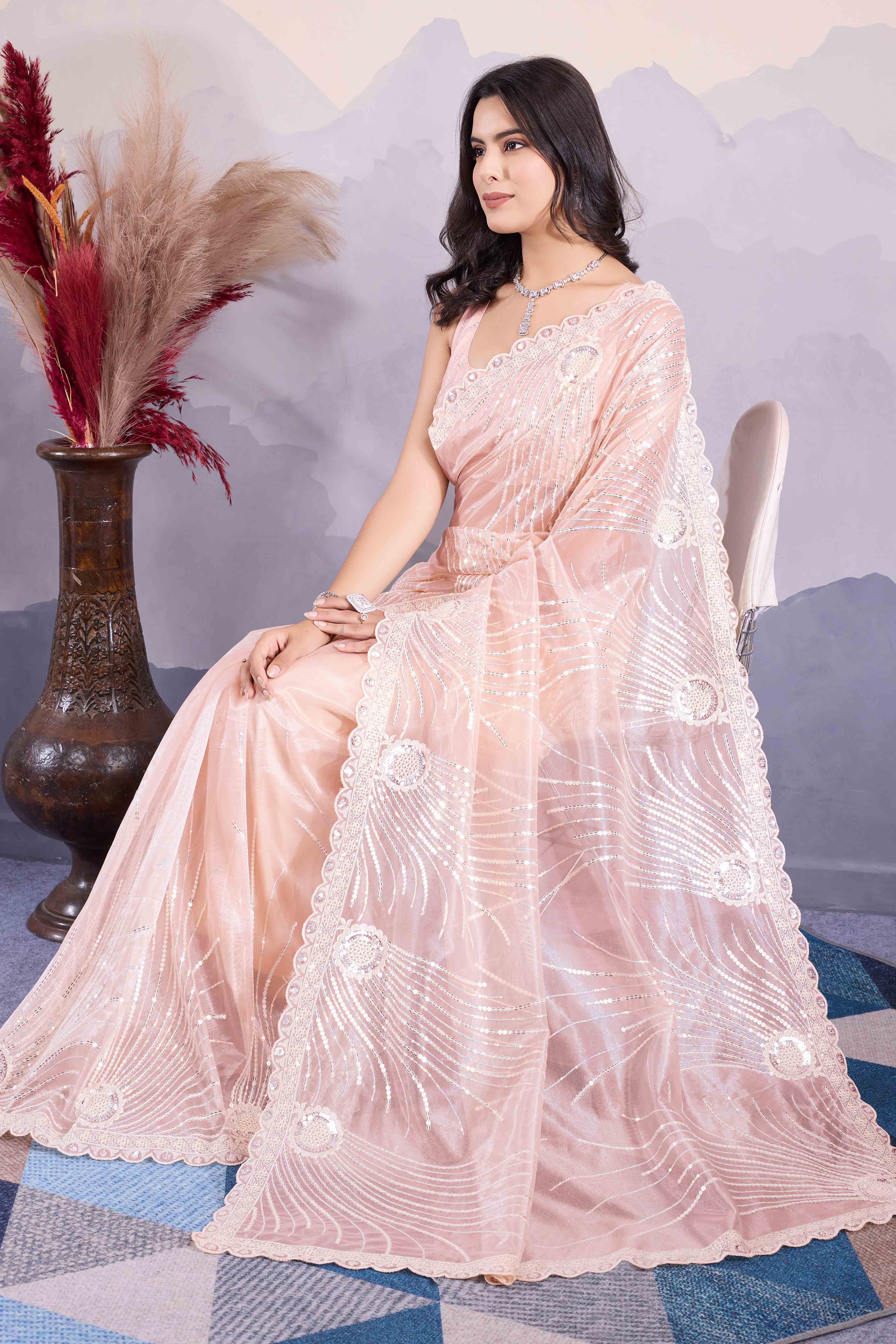Peach Sequins Embroidered Twill Net Saree