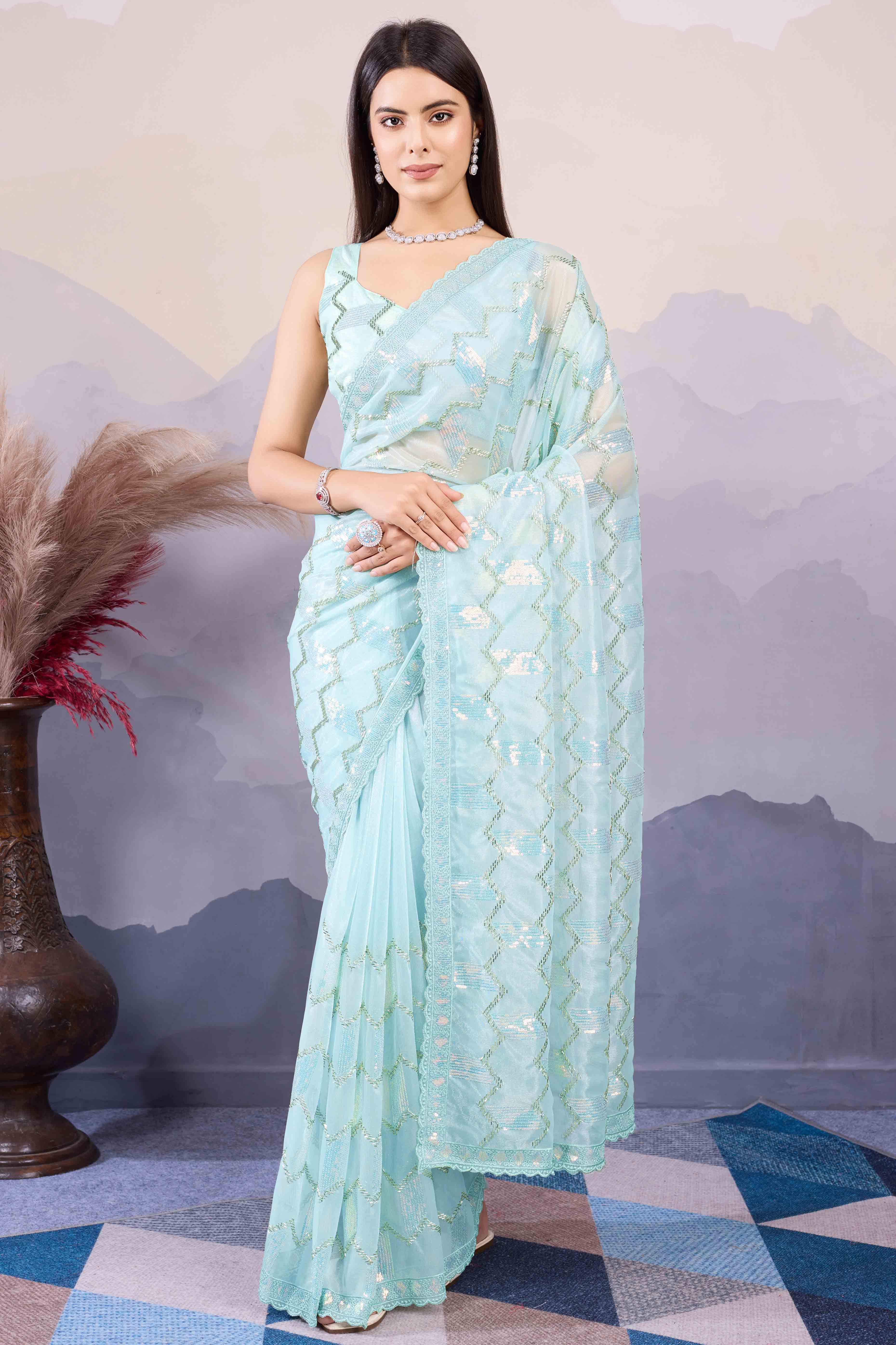 Light Turquoise Sequins Embroidered Twill Net Saree