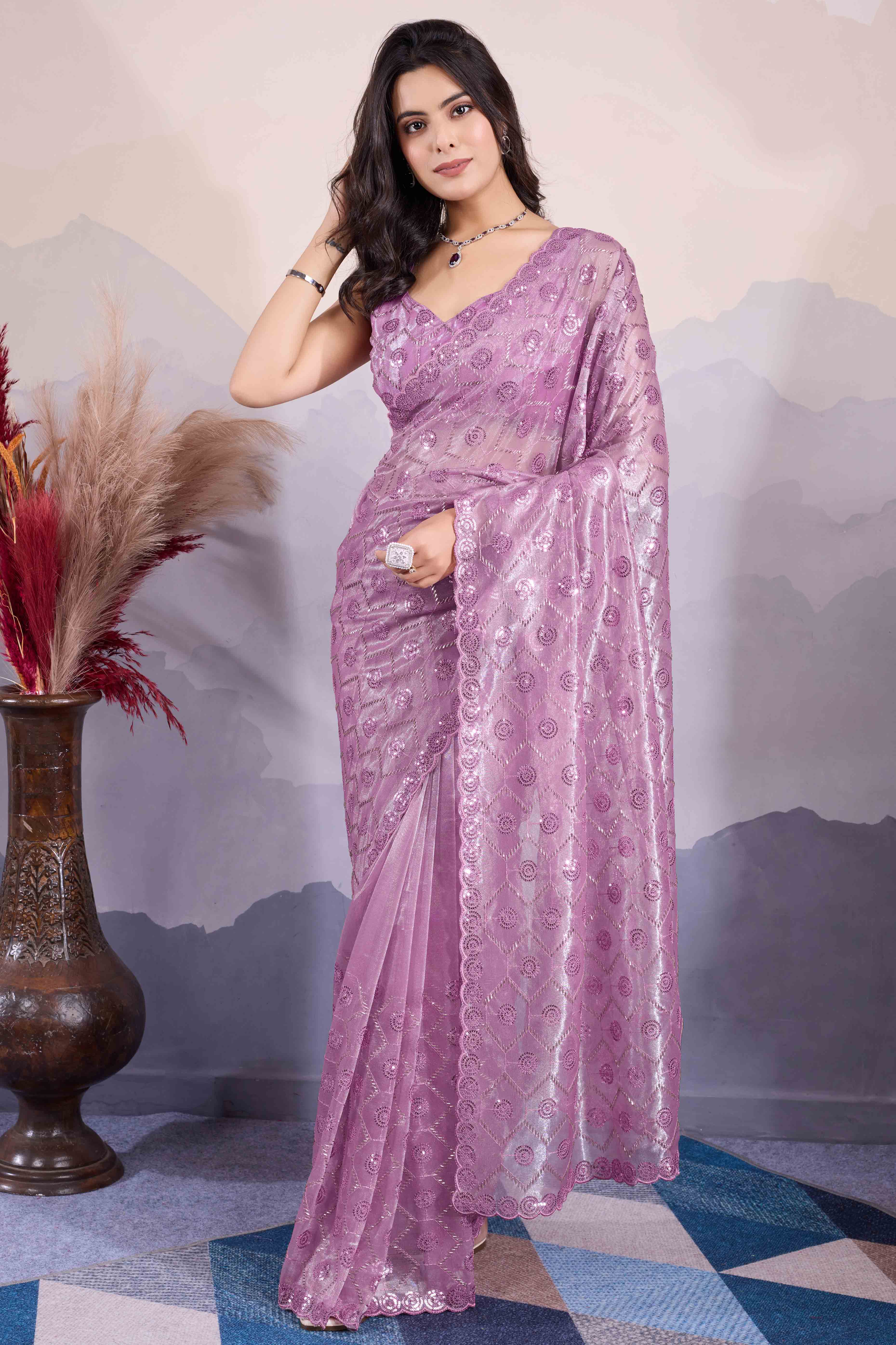 Mauve Sequins Embroidered Twill Net Saree