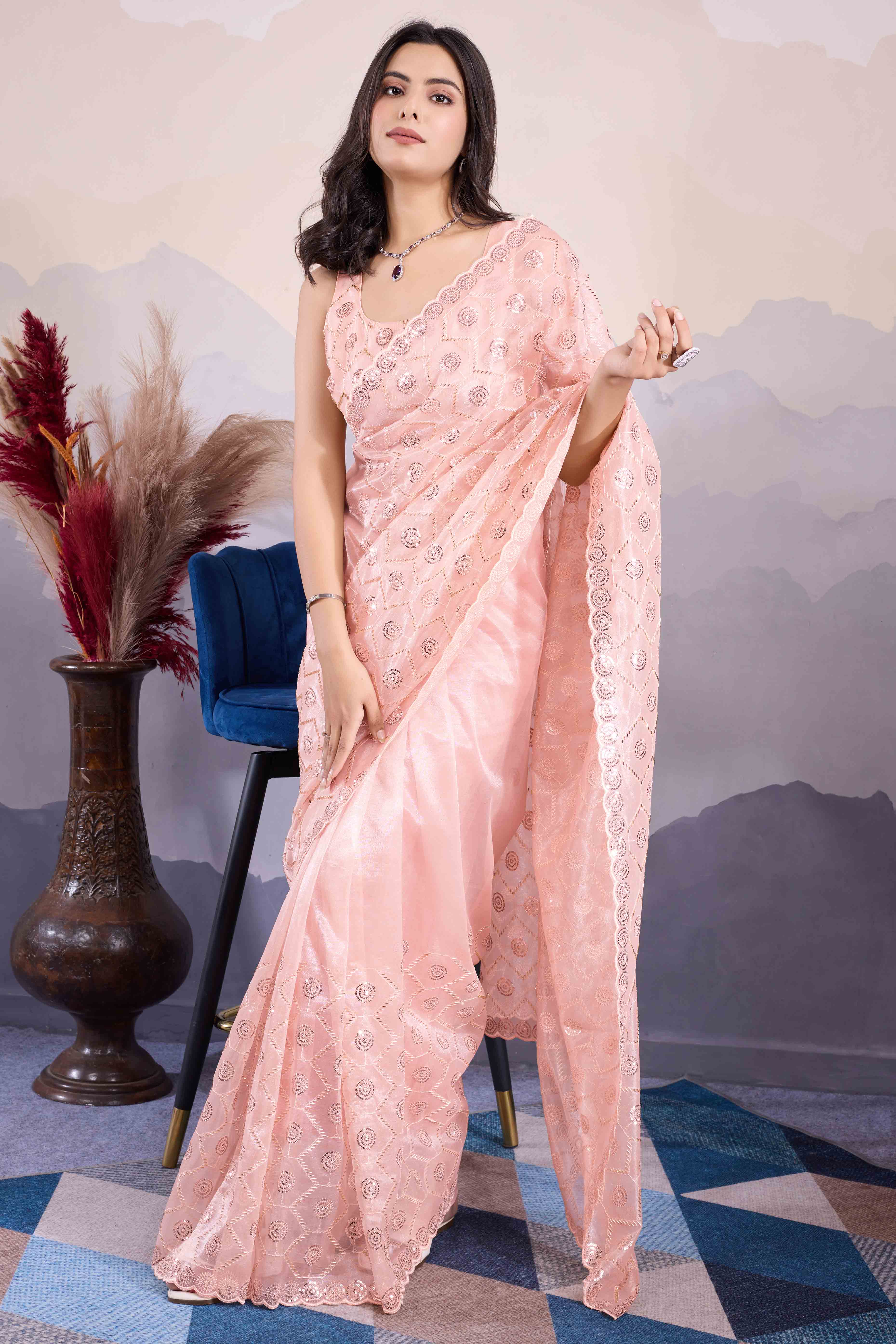 Peach Sequins Embroidered Twill Net Saree