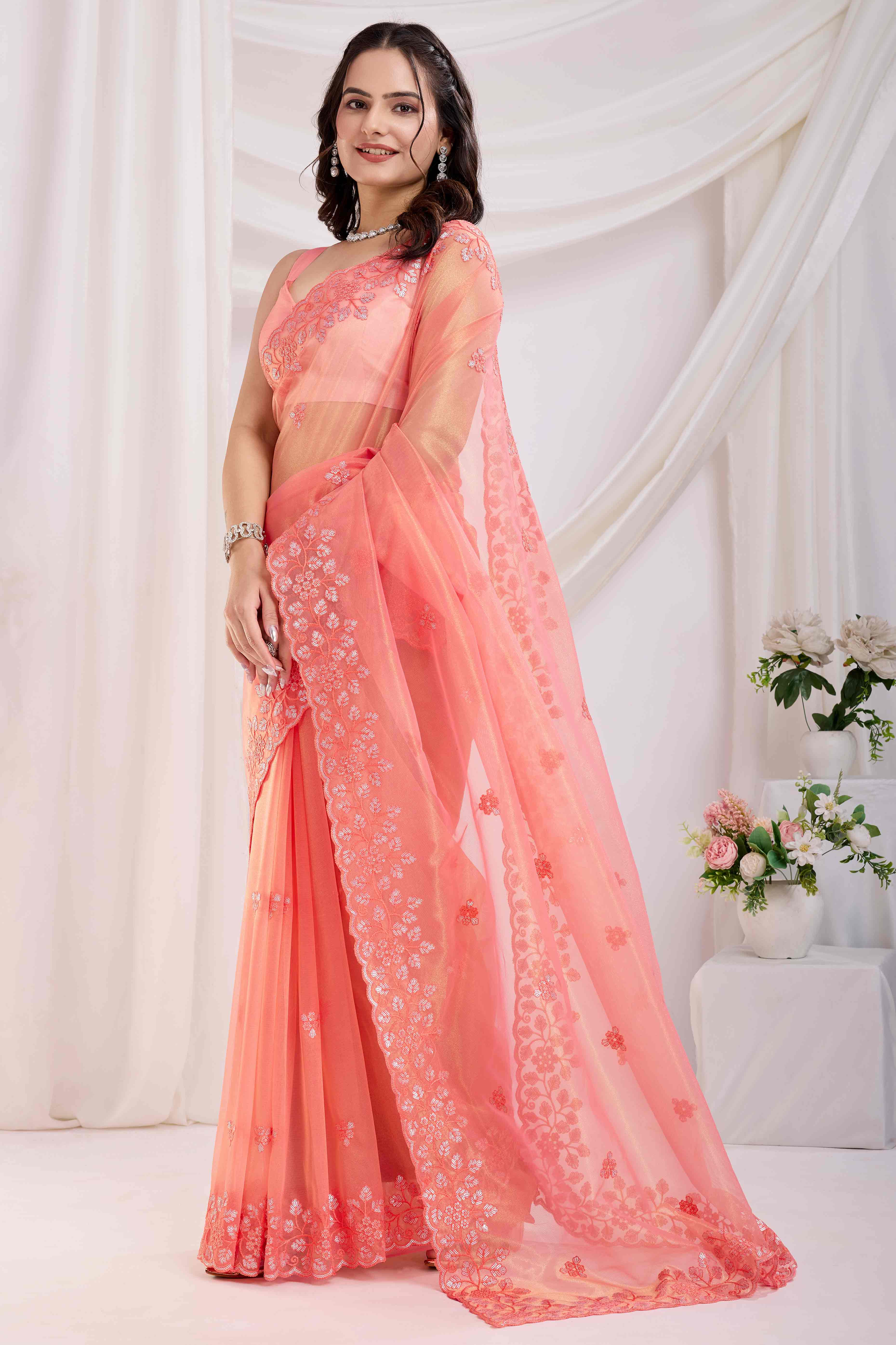 Peach Twill Net Saree Embellished With Sequin Floral Embroidery