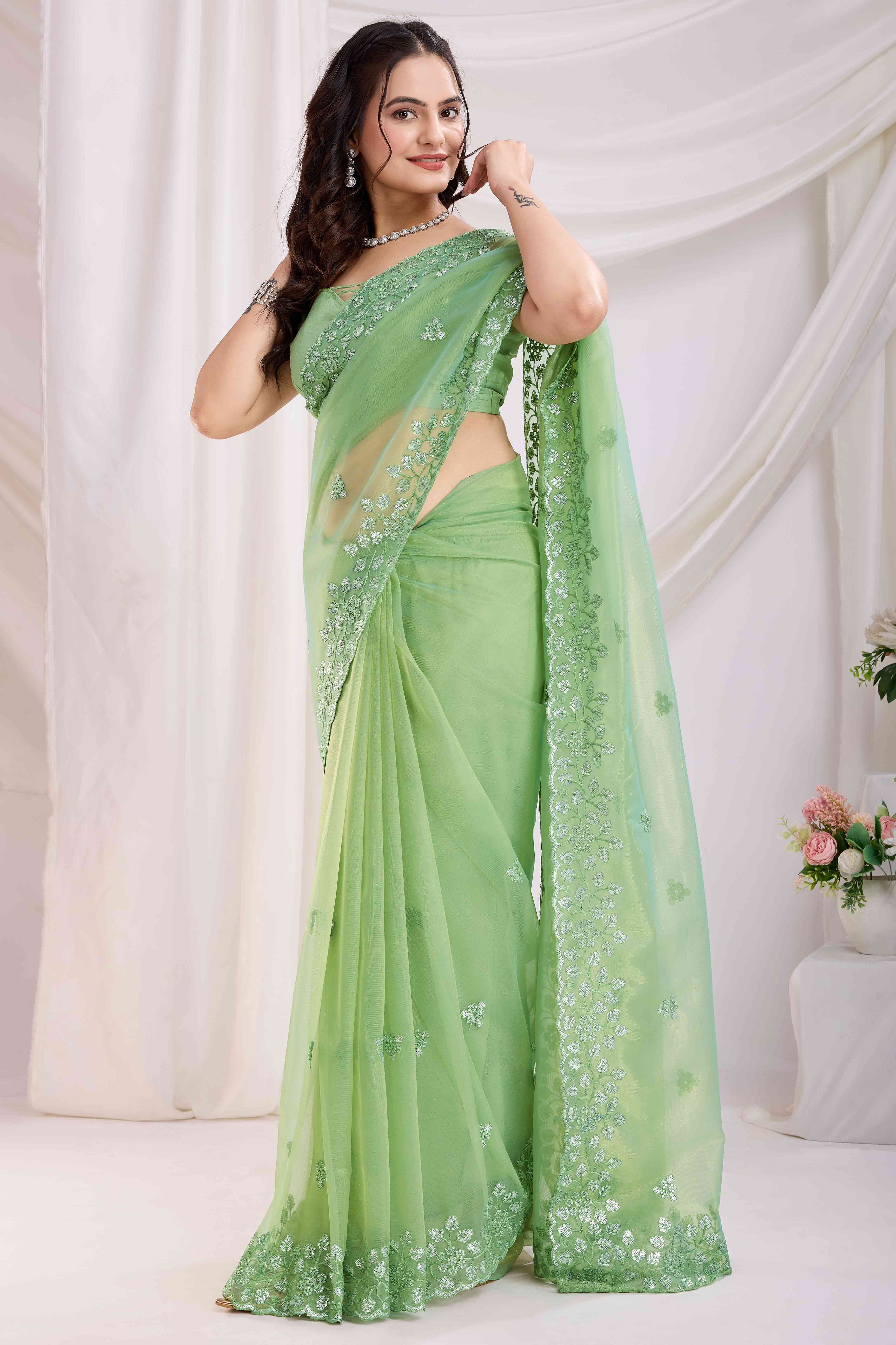 Green Twill Net Saree Embellished With Sequin Floral Embroidery