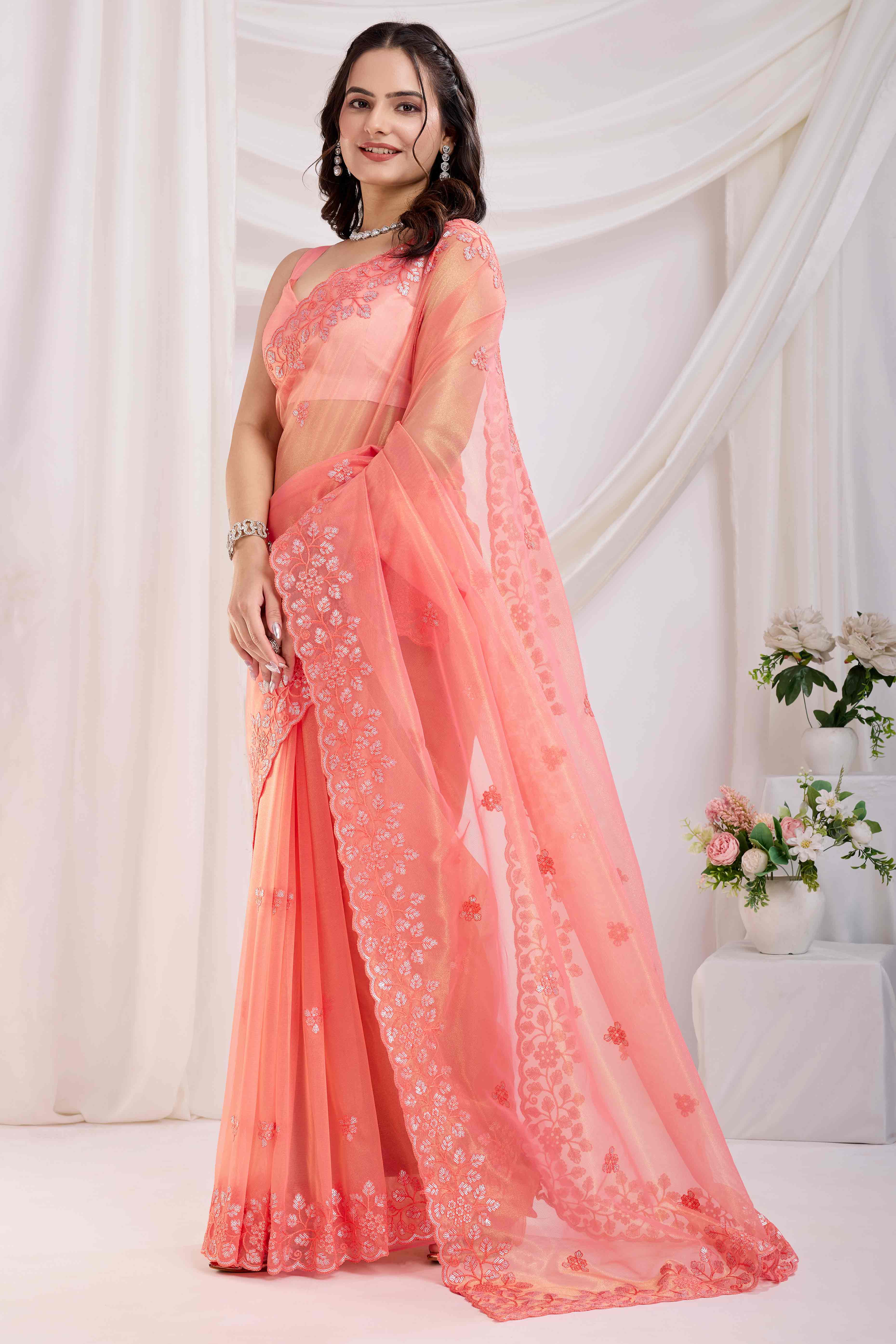 Peach Floral Sequins Embroidered Twill Net Saree