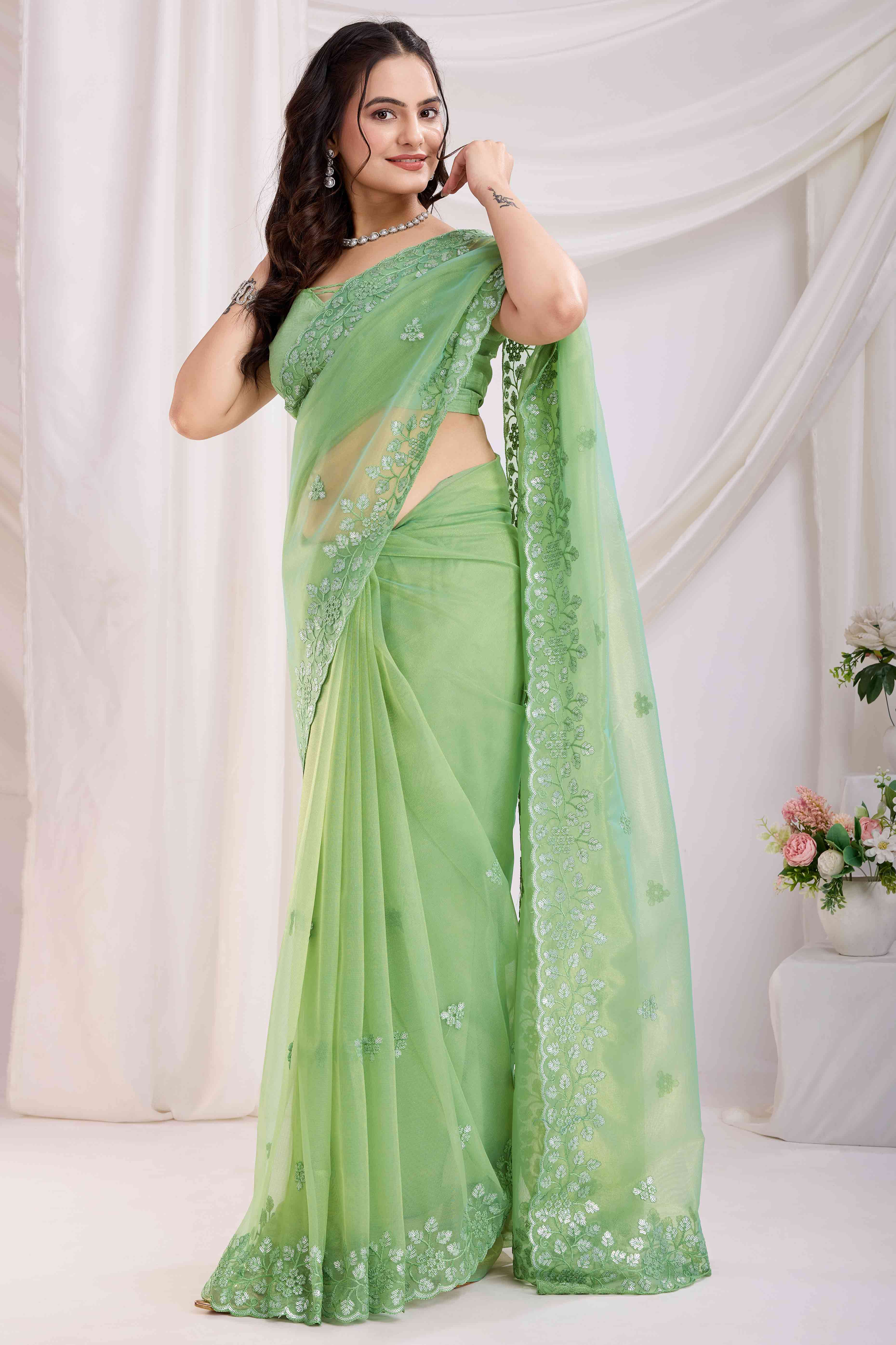 Green Floral Sequins Embroidered Twill Net Saree