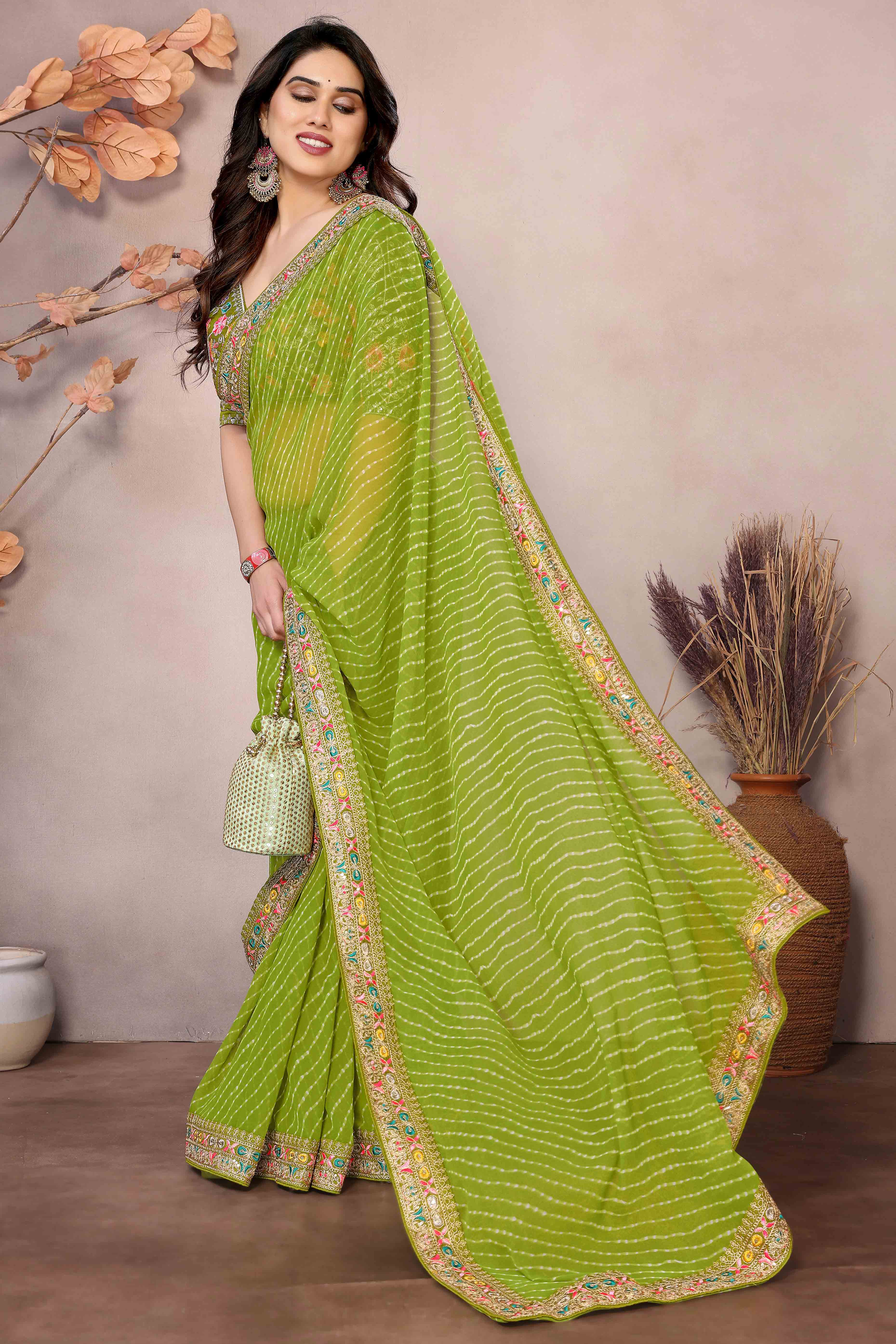 Green Striped Printed Georgette Saree With Glittering Sequin Cording Embroidered Border