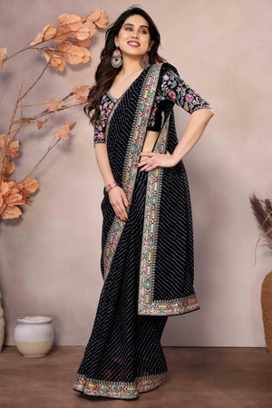Black Striped Printed Georgette Saree With Glittering Sequin Cording Embroidered Border