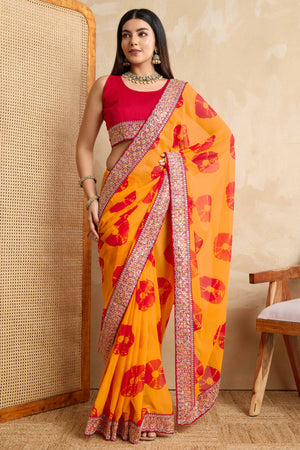 Bright Orange Georgette Saree with Contemporary Tie-Dye Patterns and Classic Lace Work Finish