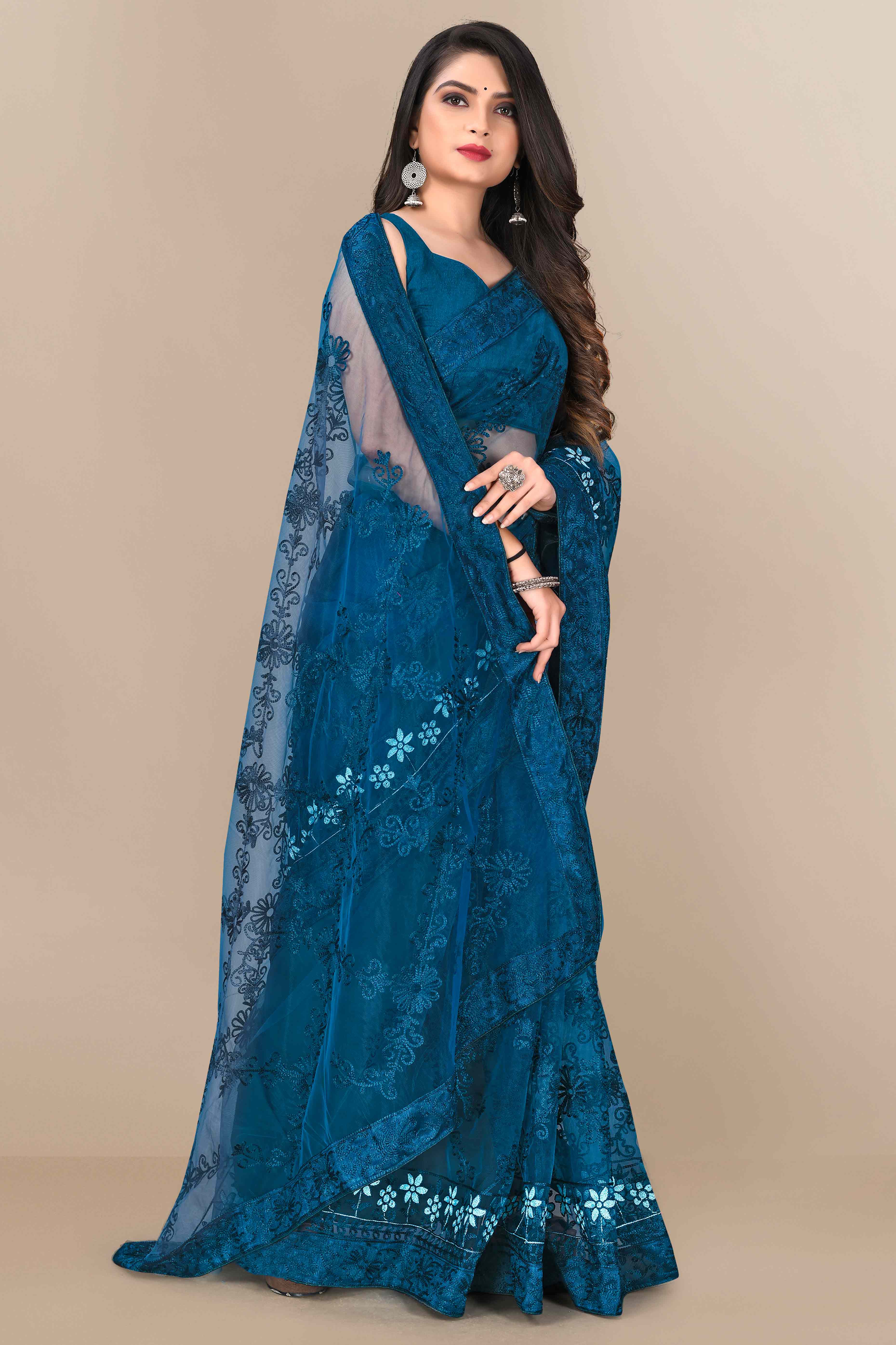 Teal Party Wear Net Saree Featuring Rich Floral Embroidery