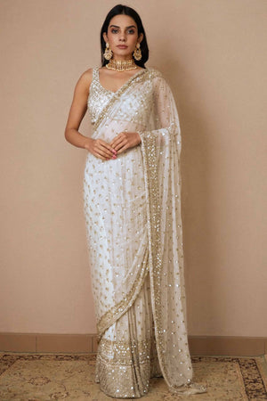 Graceful Off White Sequins Embellished Net Saree for Partywear