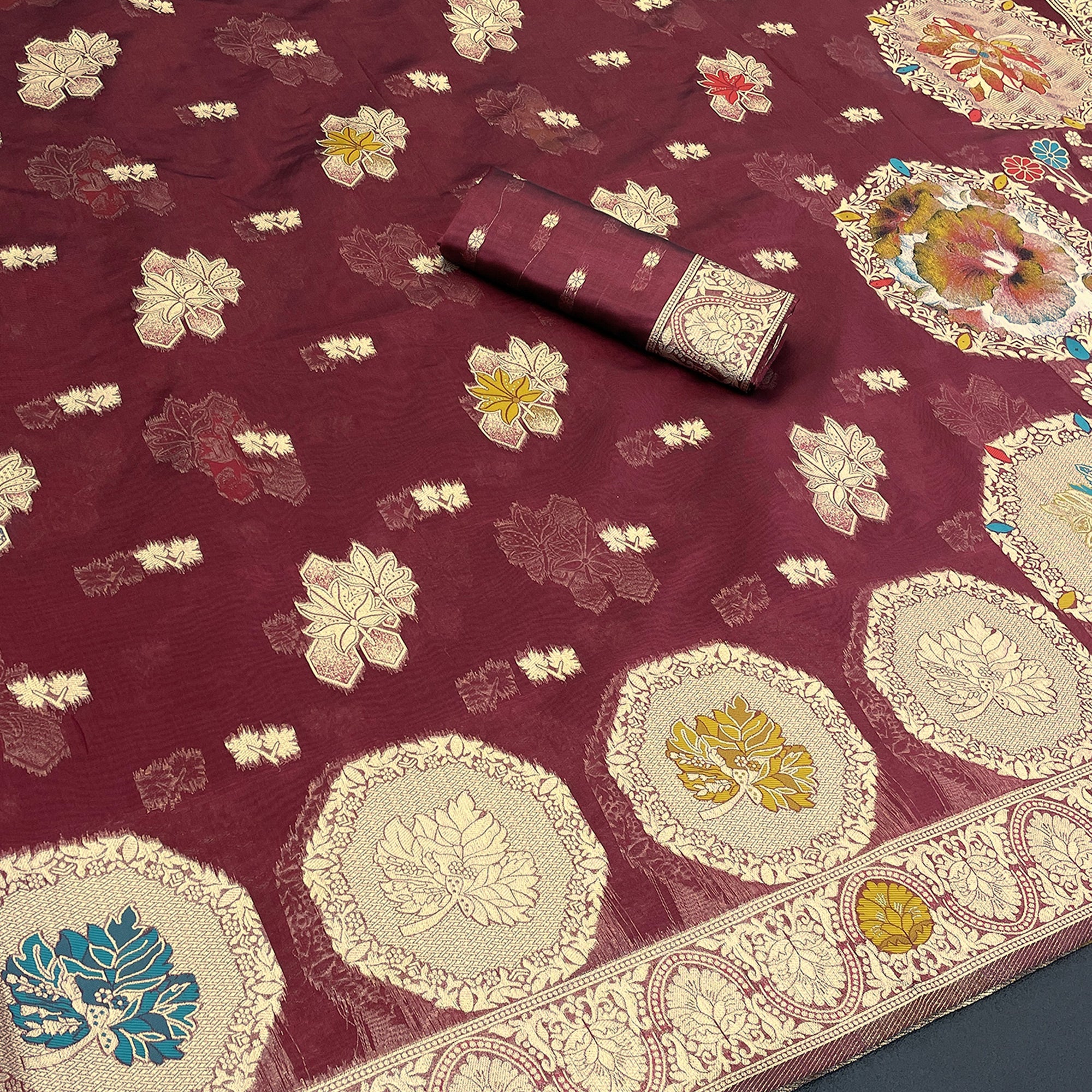 Charming Burgundy Zari Woven Floral Organza Saree Accented With Digital Printed Pallu & Latkan