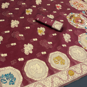 Charming Burgundy Zari Woven Floral Organza Saree Accented With Digital Printed Pallu & Latkan