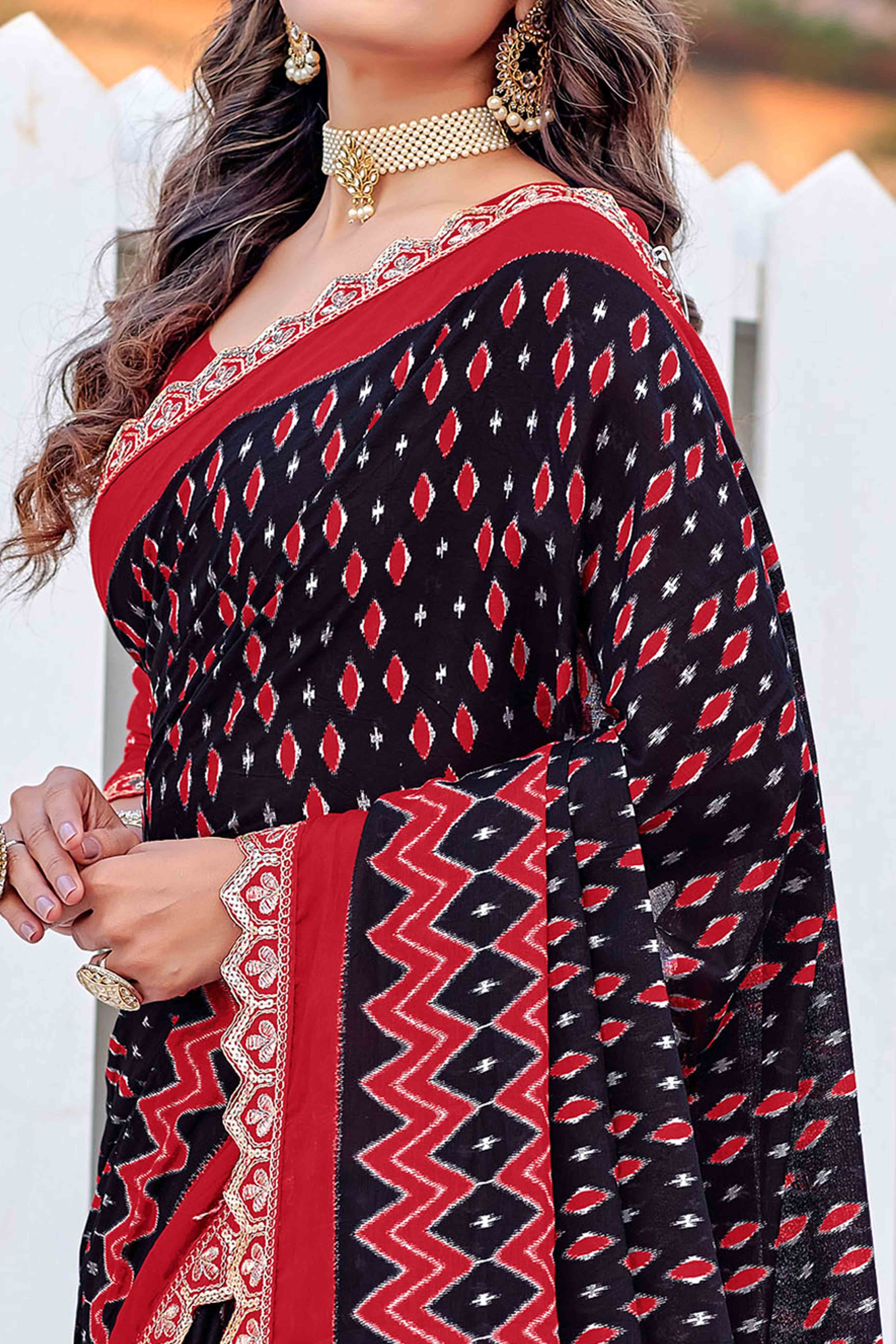 Mulmul Cotton Black & Red Ikkat Saree with Embroidered Lace Detailing