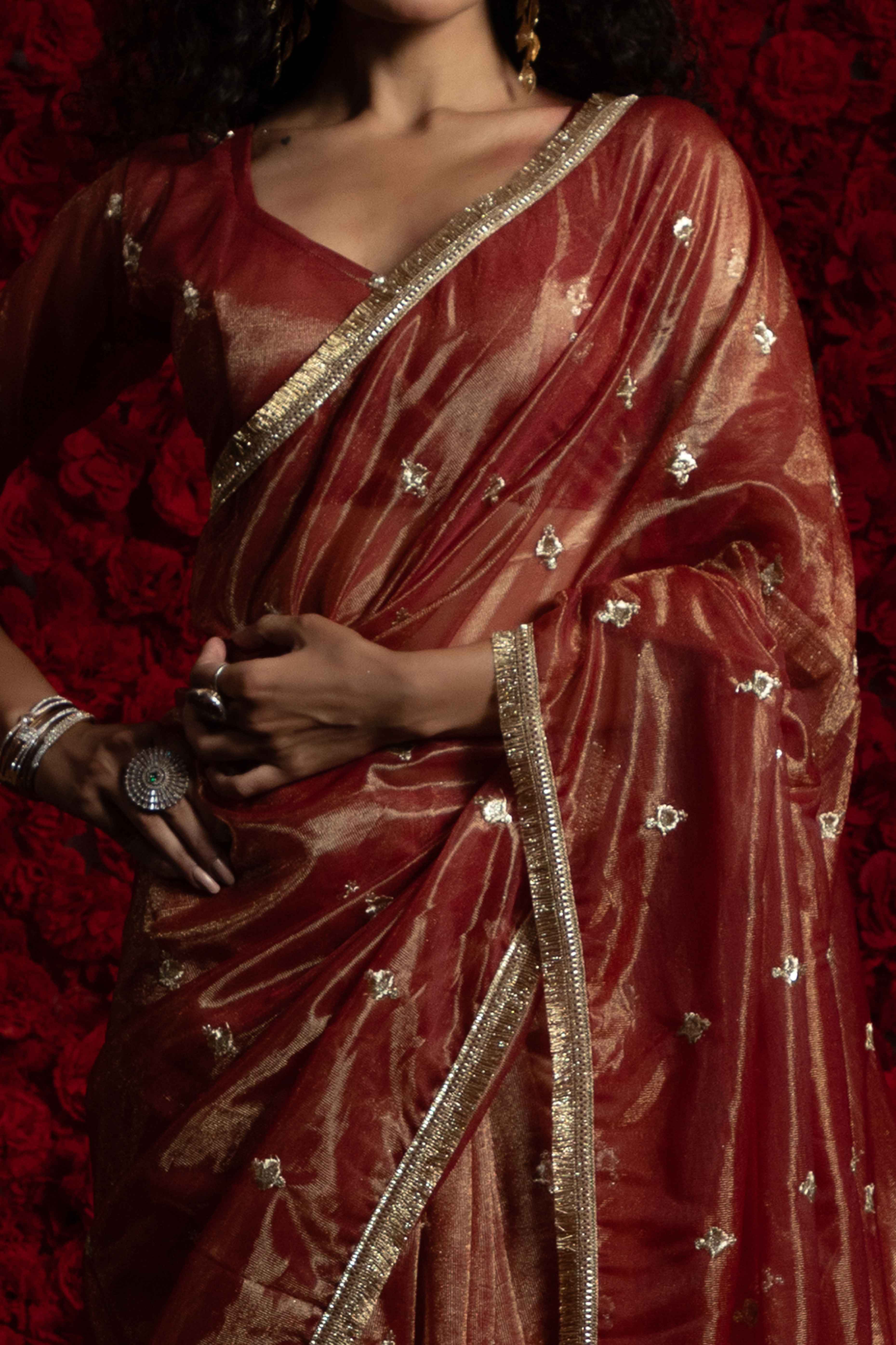 Brick Red Floral Zari Embroidered Net Organza Saree with Intricate Handwork Lace Border