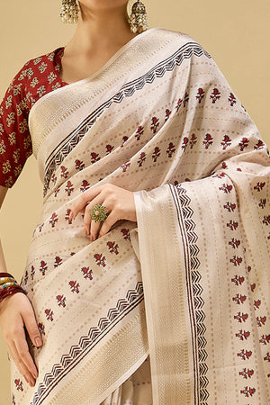 Soft Cream Katki Cotton-Silk Saree With Subtle Floral Motifs & Tassel Edge Pallu