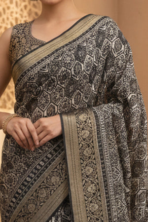 Elegant Black Floral Viscose Saree Highlighted With Intricate Weaving Border & Tassel Pallu