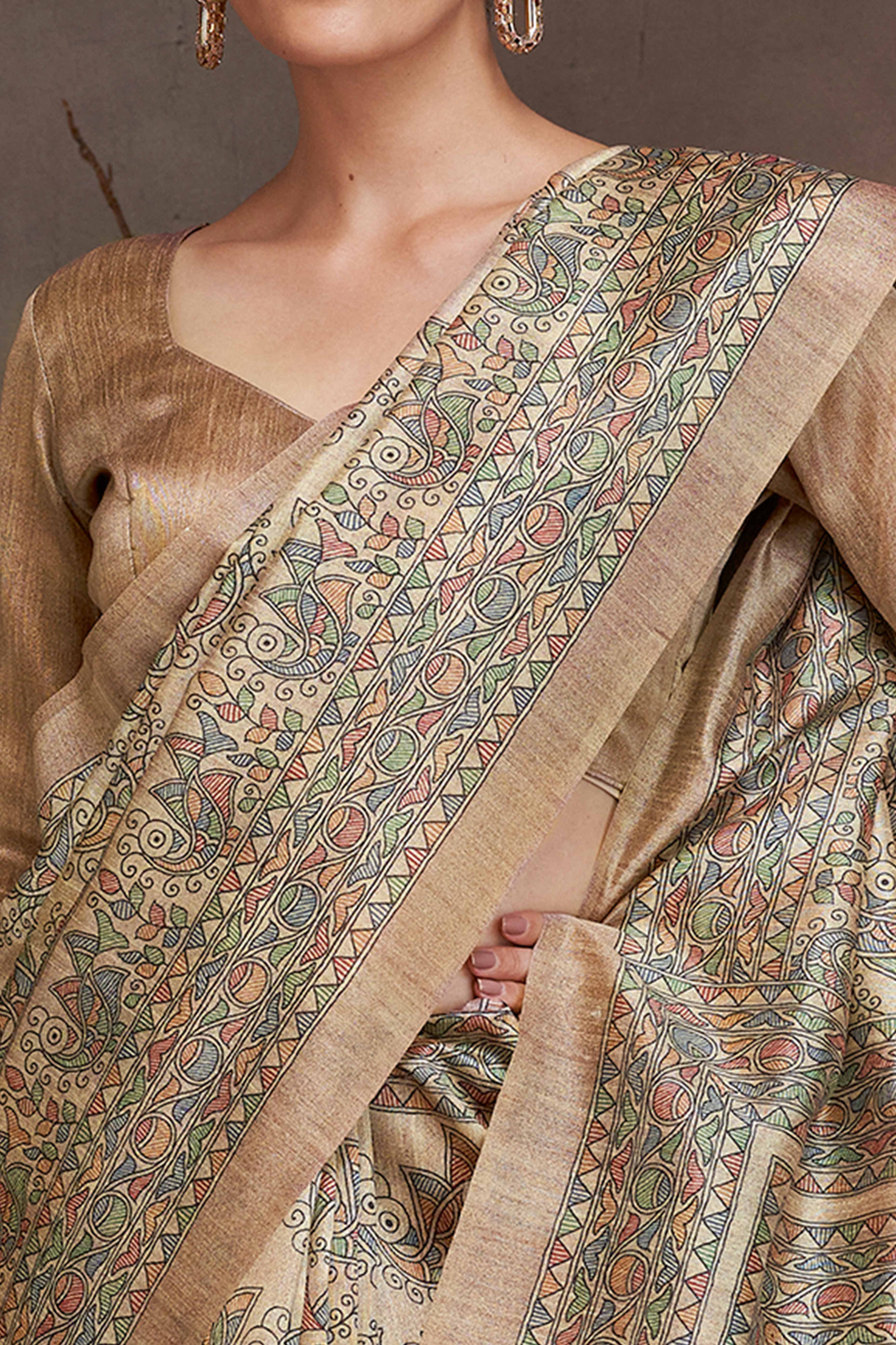 Timeless Beige Saree with Ethnic Madhubani Floral Art