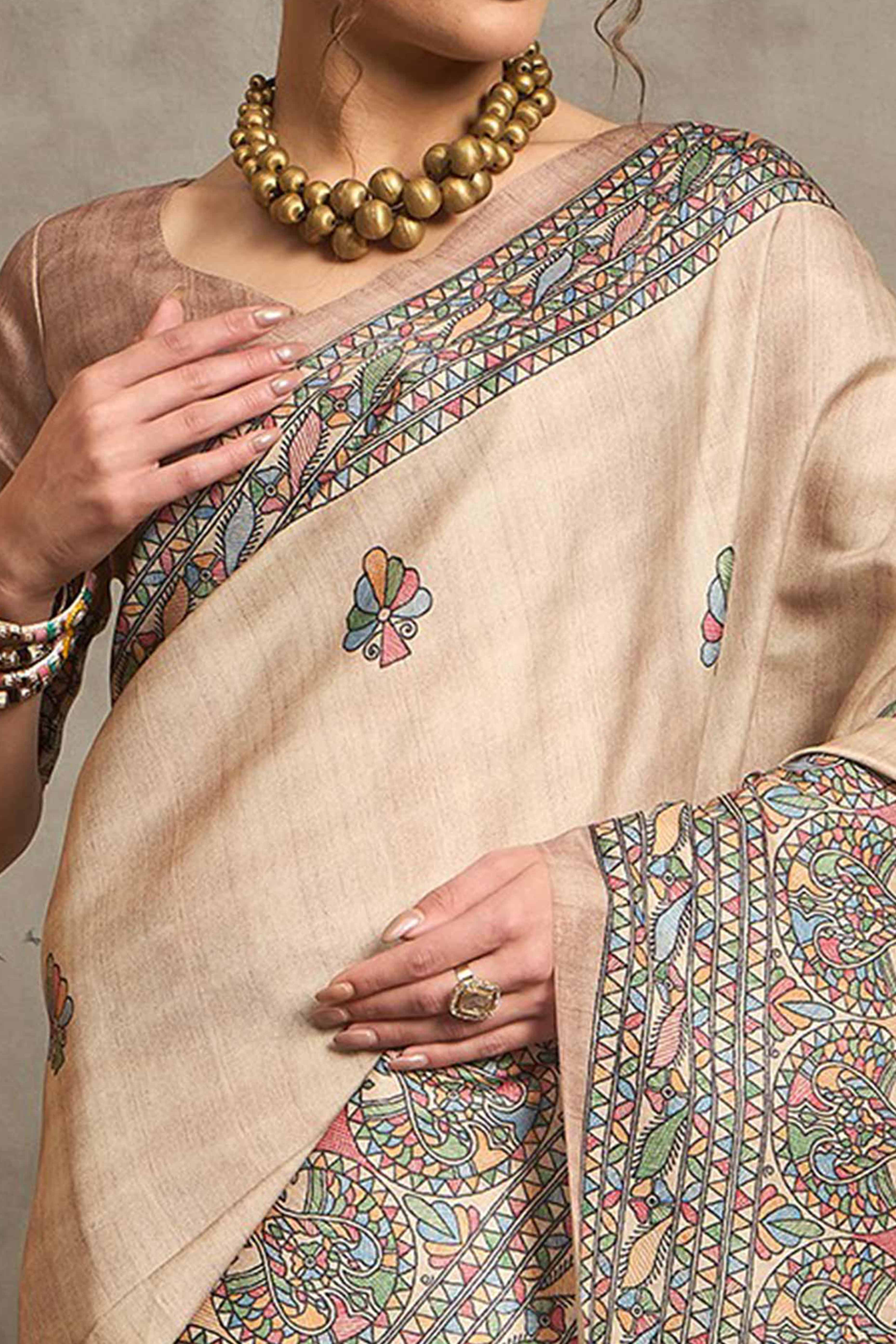 Elegant Cream Art Silk Saree Adorned with Traditional Madhubani Art-Inspired Prints