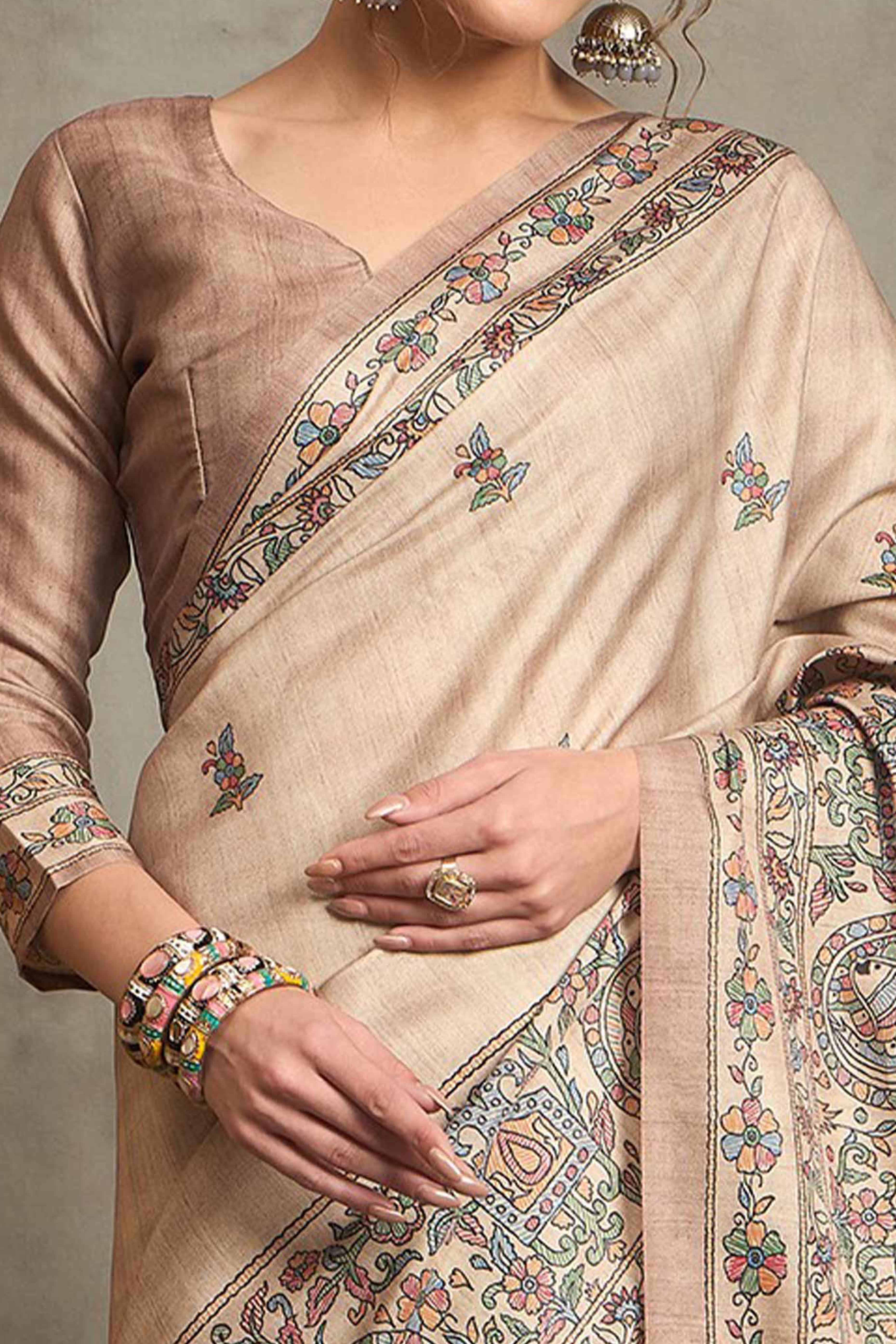 Cream Ethnic Art Silk Saree Highlighting Rich Madhubani Printwork and Artistic Flair