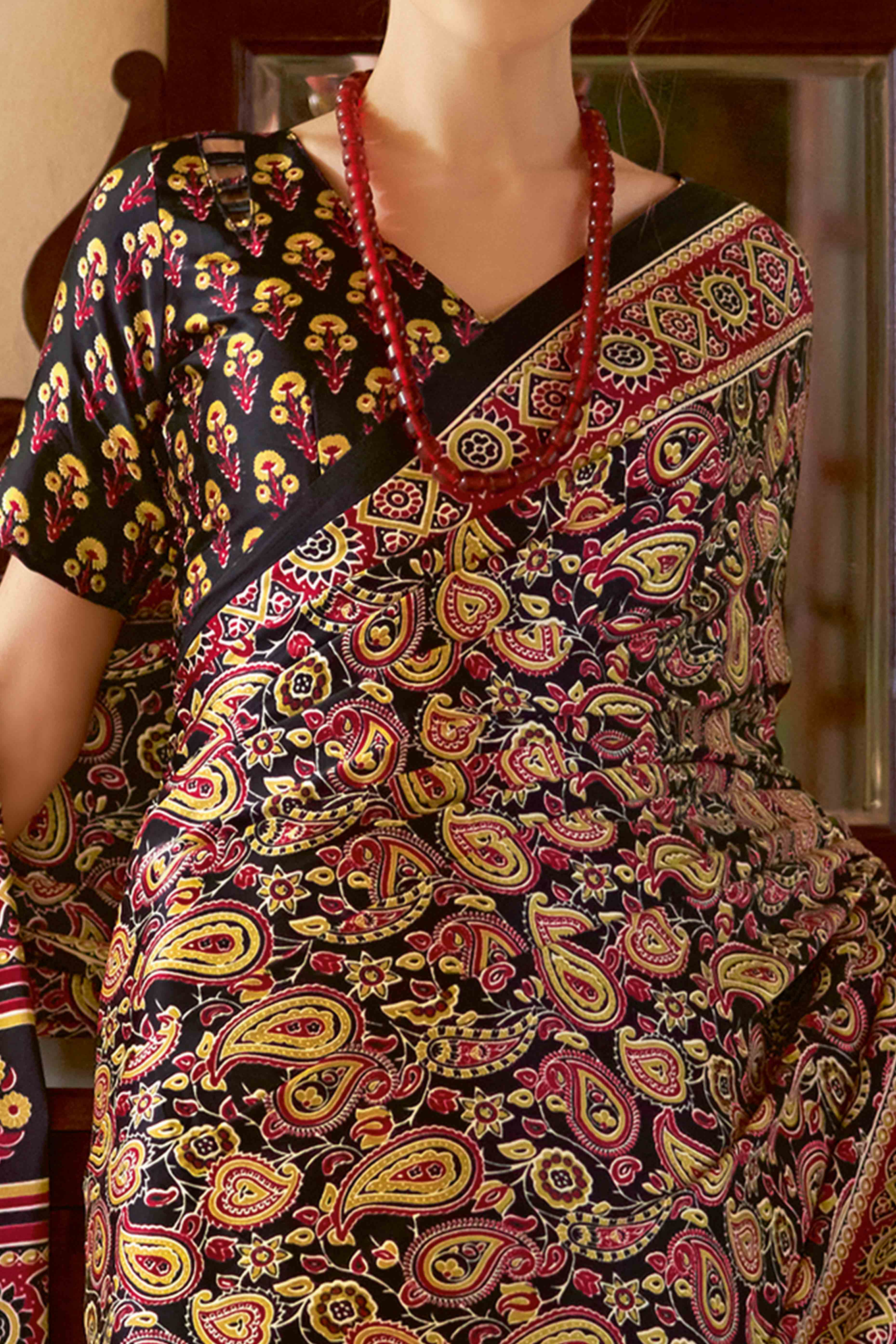 Black Floral Ajrakh Printed Satin Saree With Tassels