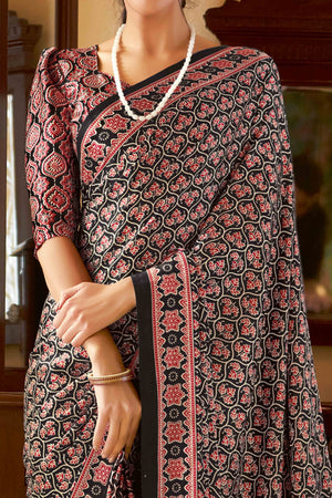 Black Floral Ajrakh Printed Satin Saree With Tassels