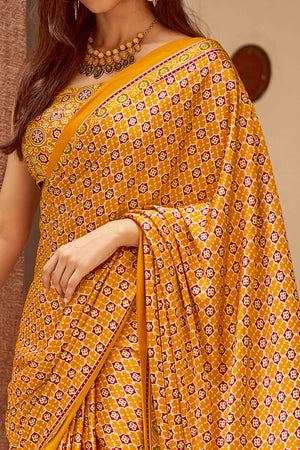 Mustard Floral Ajrakh Printed Satin Saree With Tassels