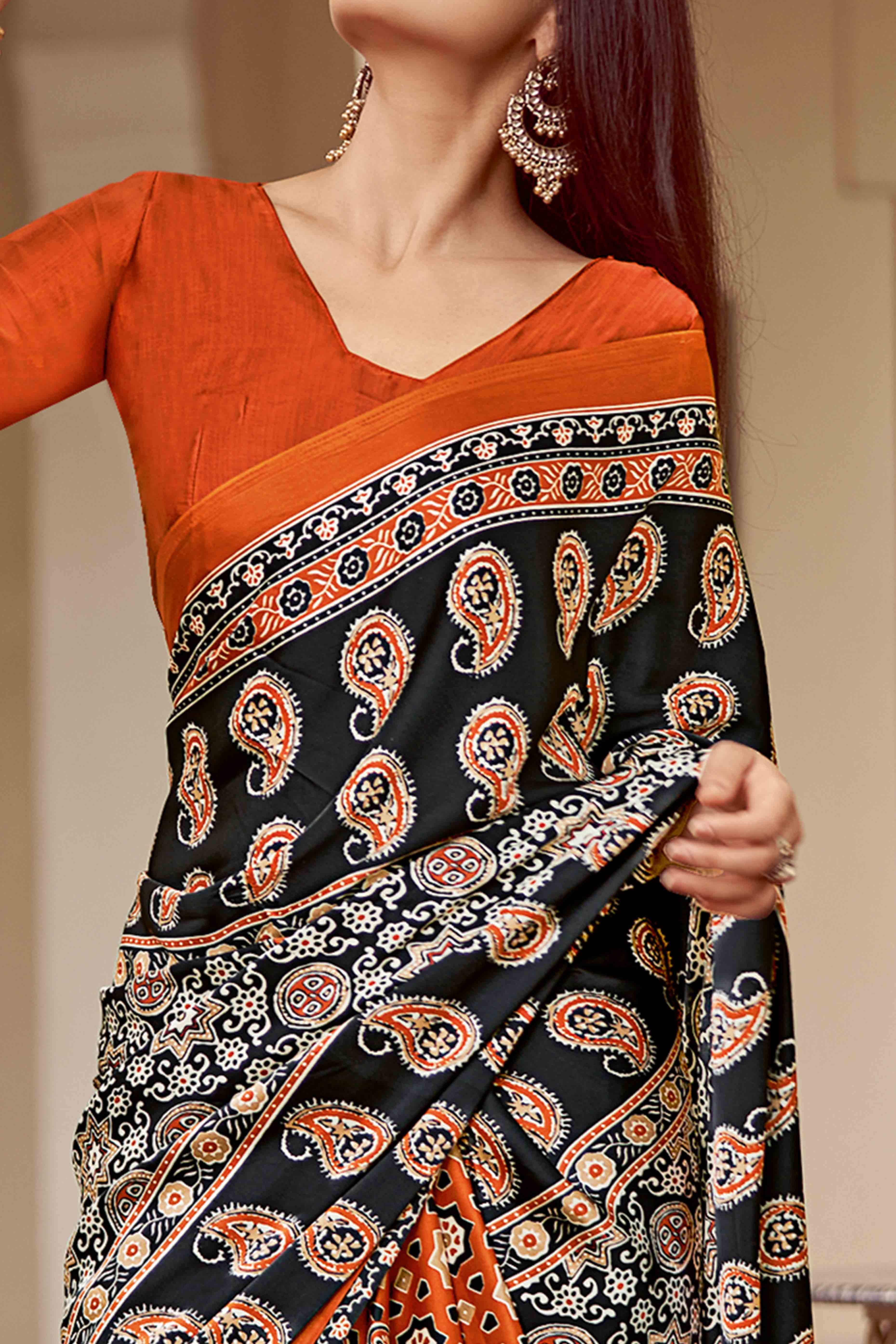Orange & Black Floral Ajrakh Printed Satin Saree With Tassels