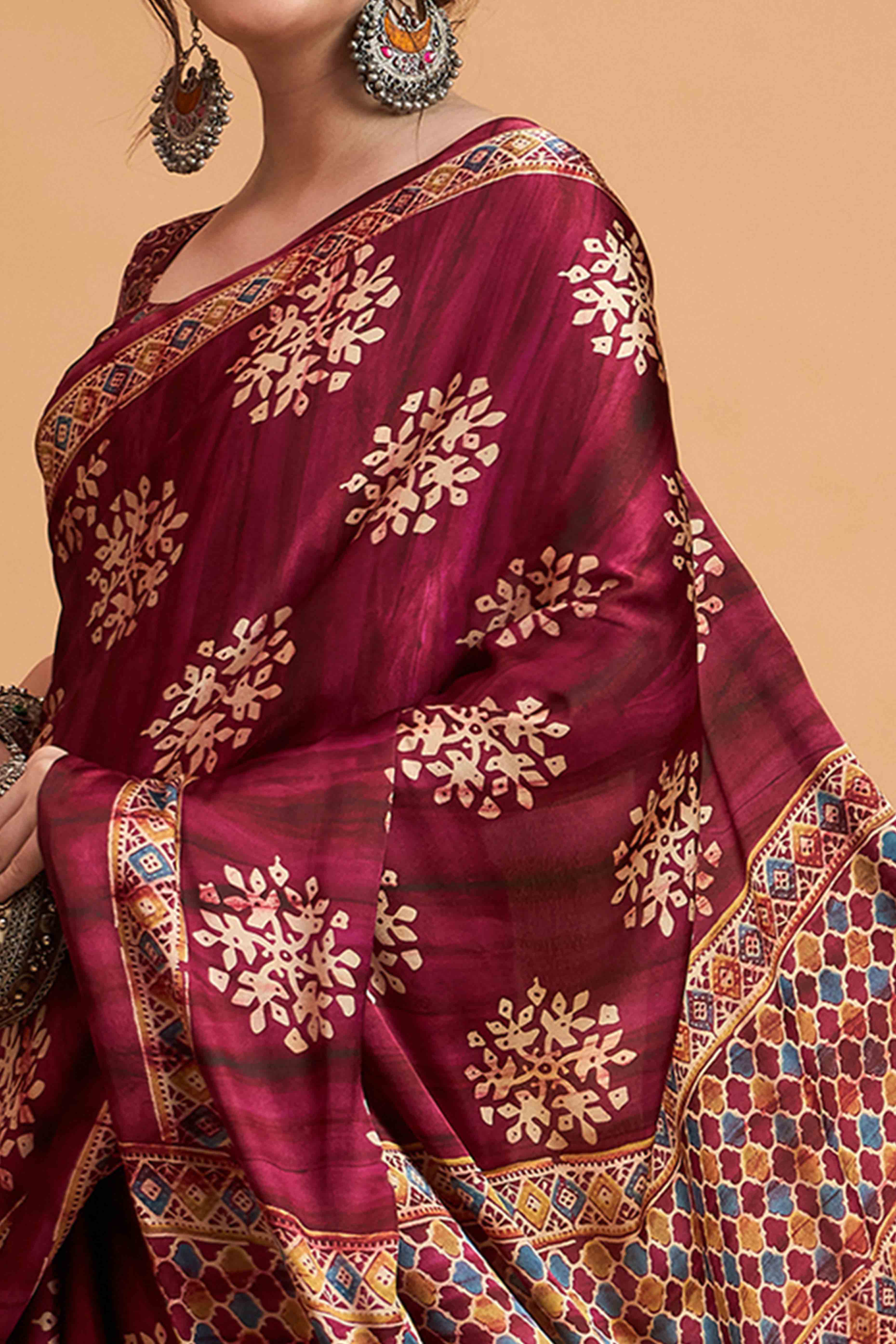 Wine Floral Ajrakh & Batik Print Saree In Luxurious Modal Satin With Tassel Pallu