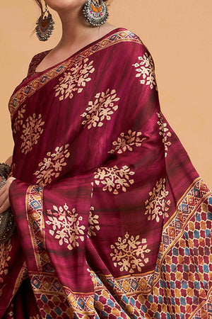 Wine Floral Ajrakh & Batik Print Saree In Luxurious Modal Satin With Tassel Pallu