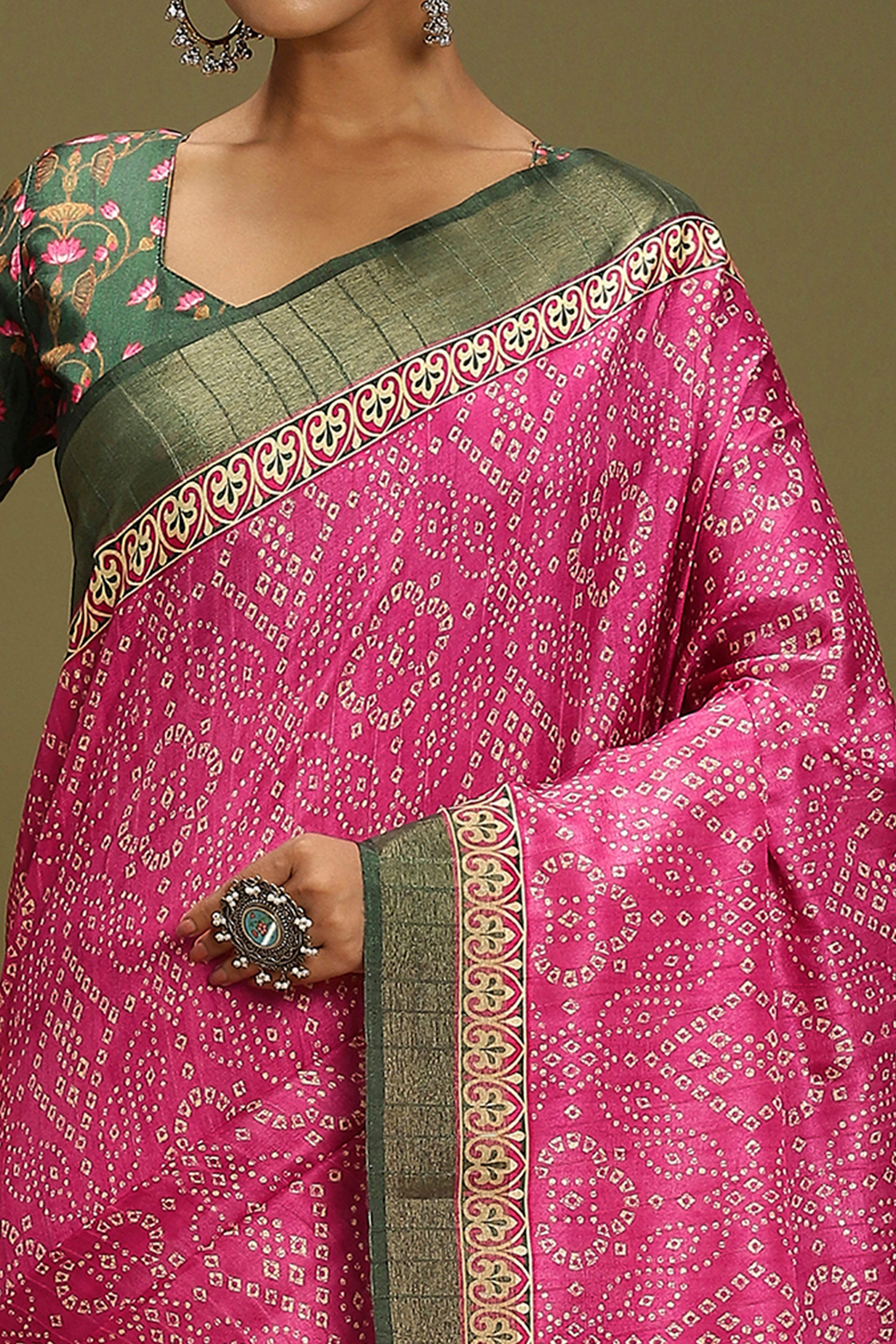 Pink Silk Blend Saree Decorated with Vibrant Bandhani Prints and Festive Detailing