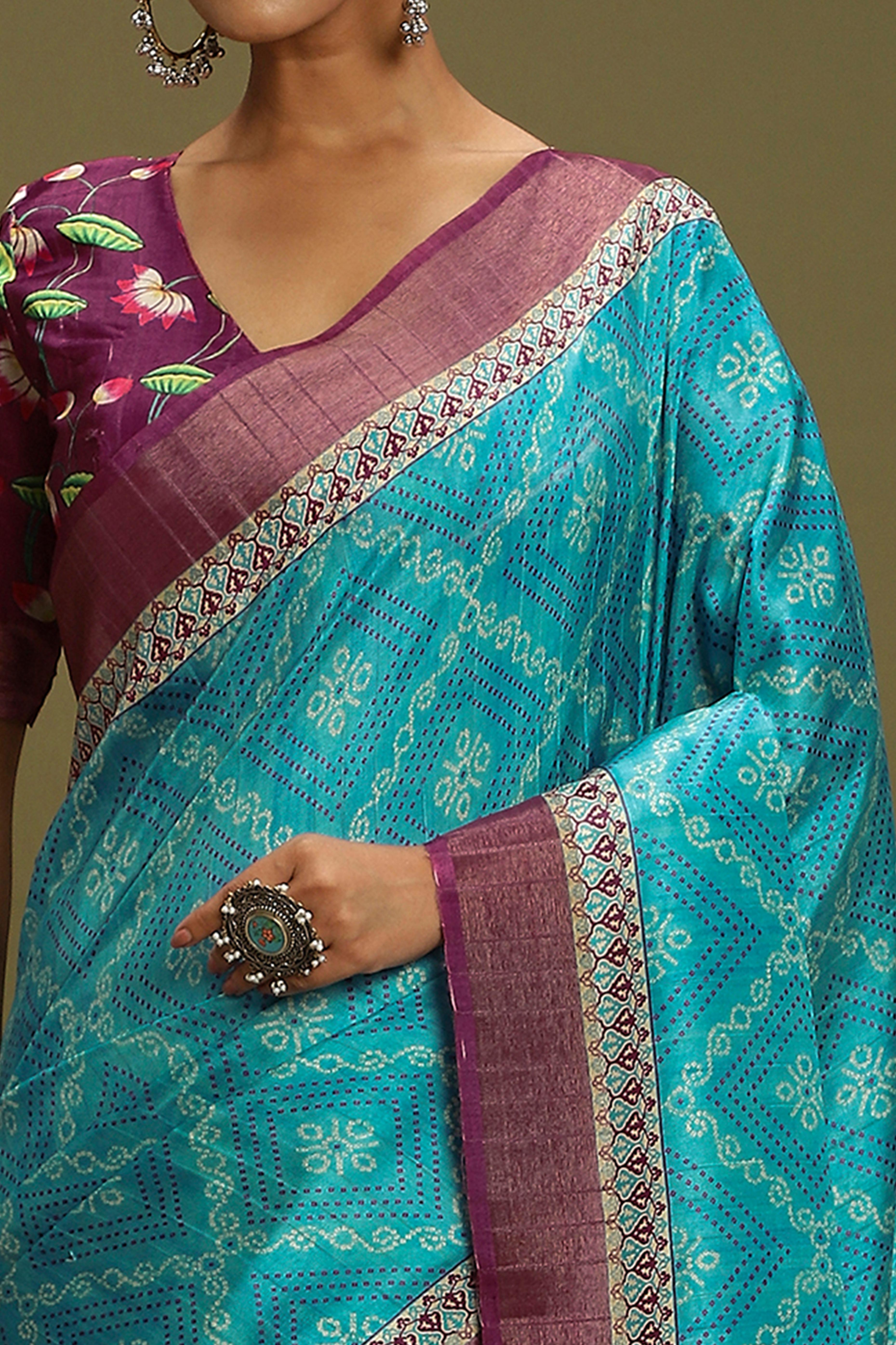 Turquoise Silk Blend Saree Decorated with Vibrant Bandhani Prints and Festive Detailing