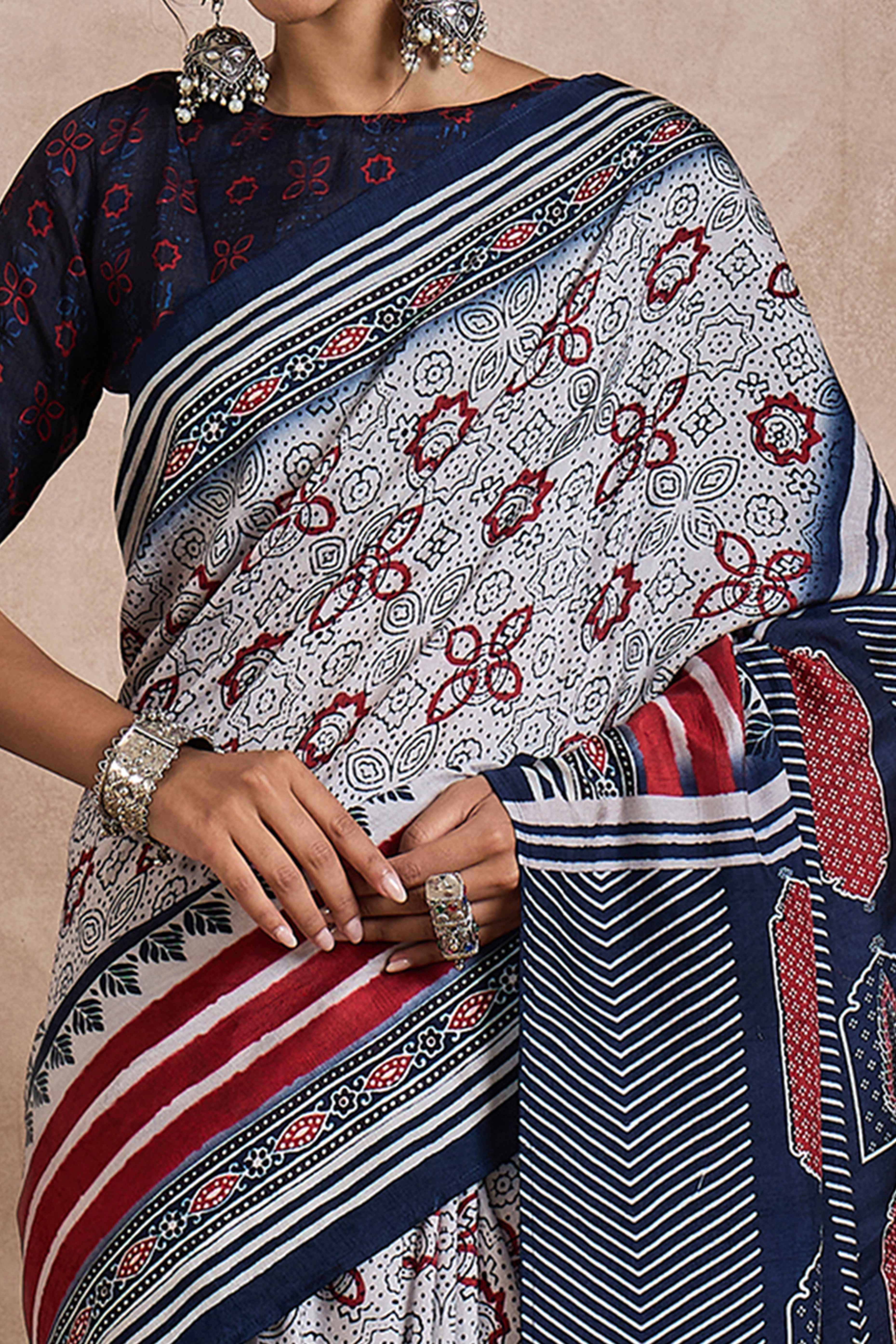 White Dola Silk Saree Featuring Heritage Ajrakh Prints for Celebratory Occasions