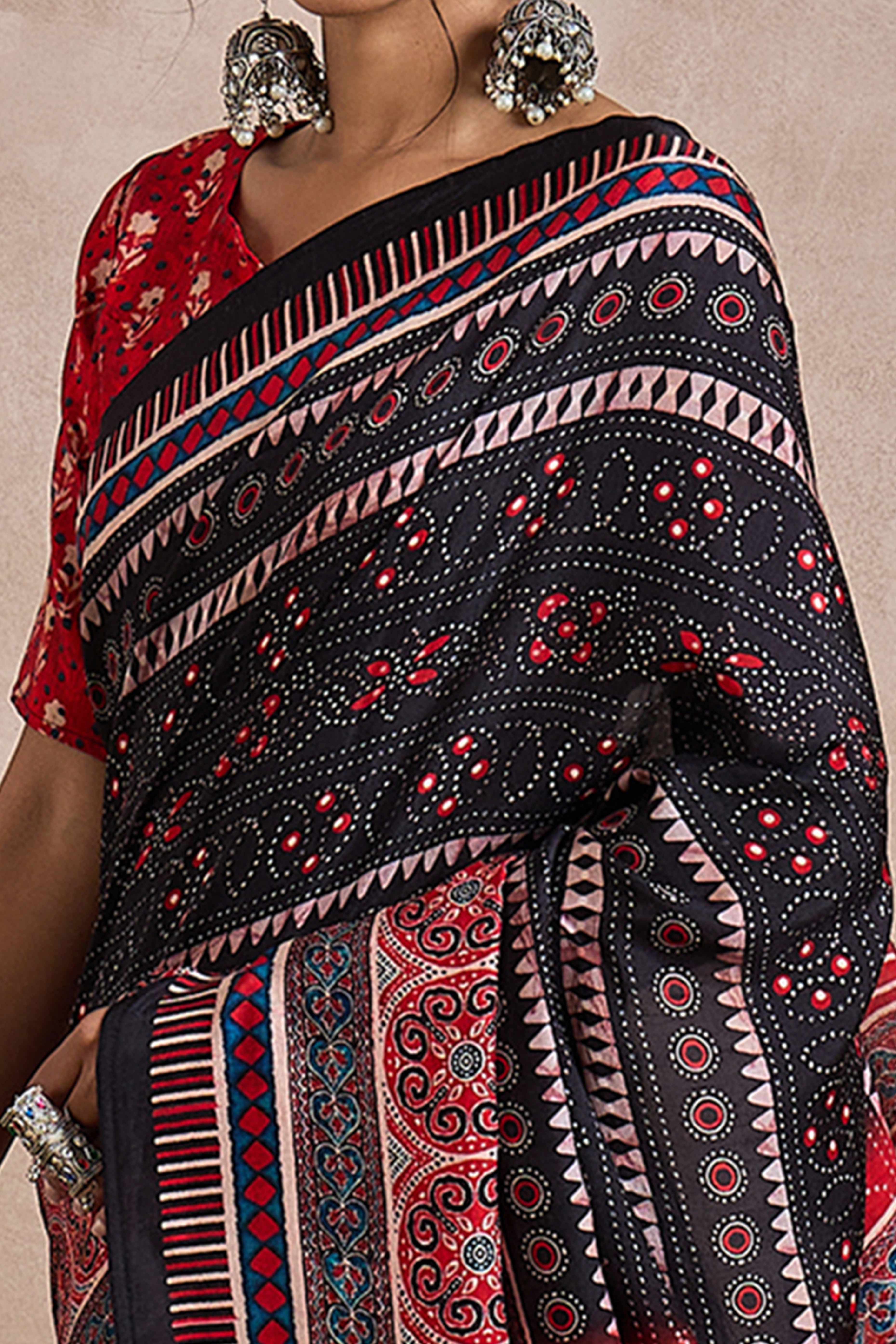 Black Dola Silk Saree Featuring Heritage Ajrakh Prints for Celebratory Occasions