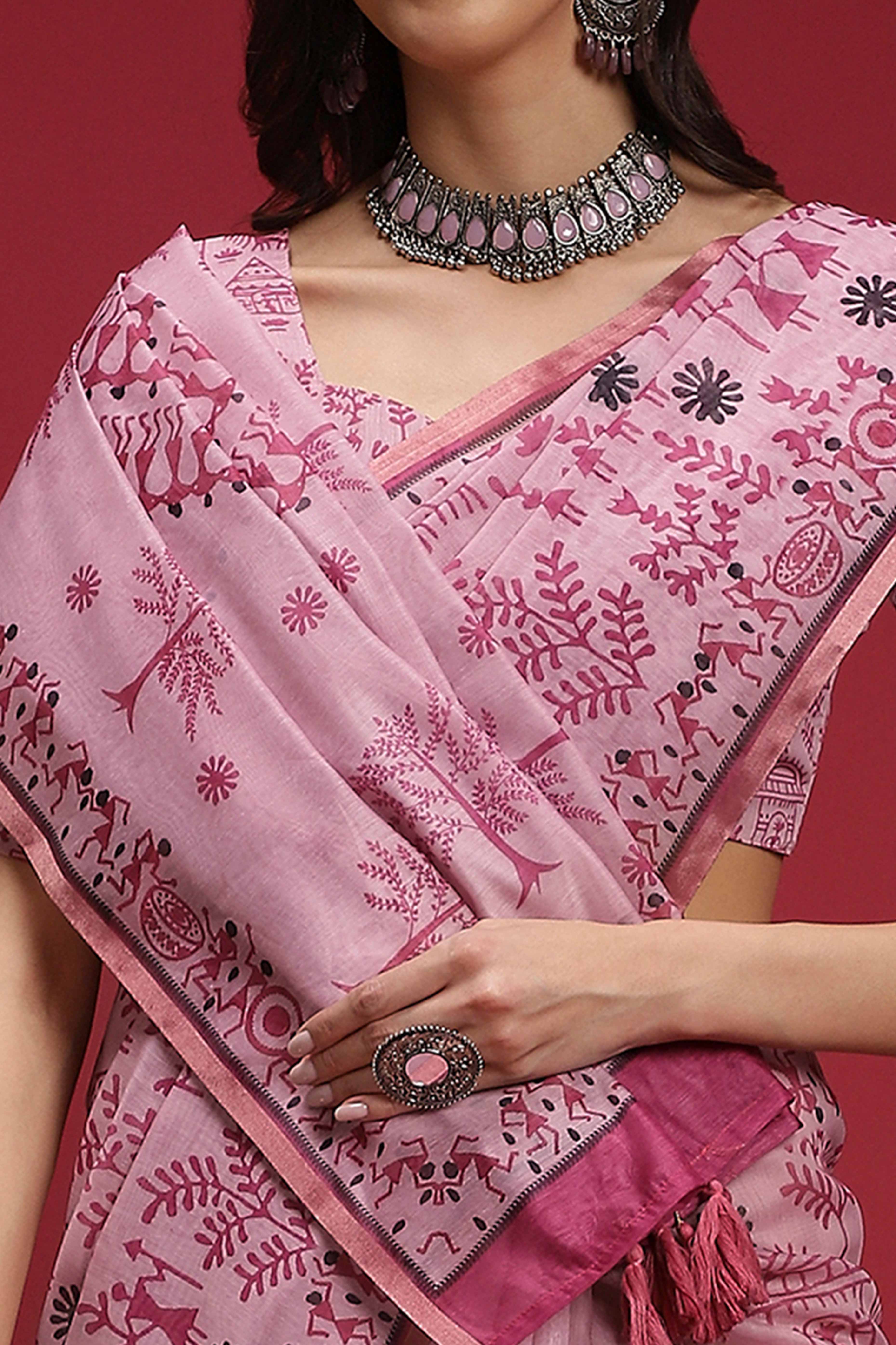 Pink Linen Cotton Saree Featuring Traditional Warli Prints & Tassel Pallu
