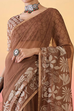 Brown Linen Cotton Saree Featuring Elegant Floral & Bird Prints With Tassel Pallu