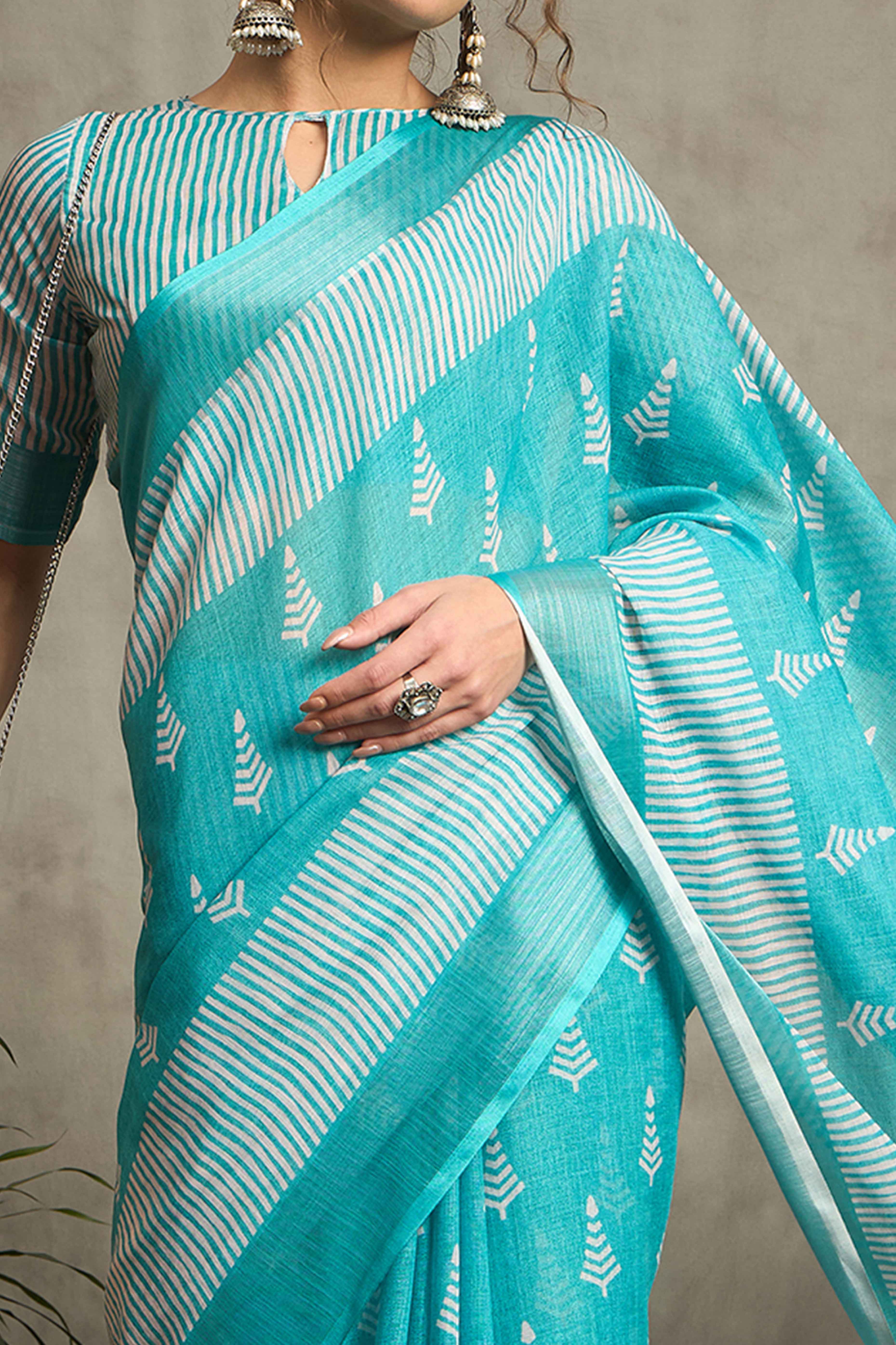 Turquoise Pure Linen Saree with Intricate Zari Work