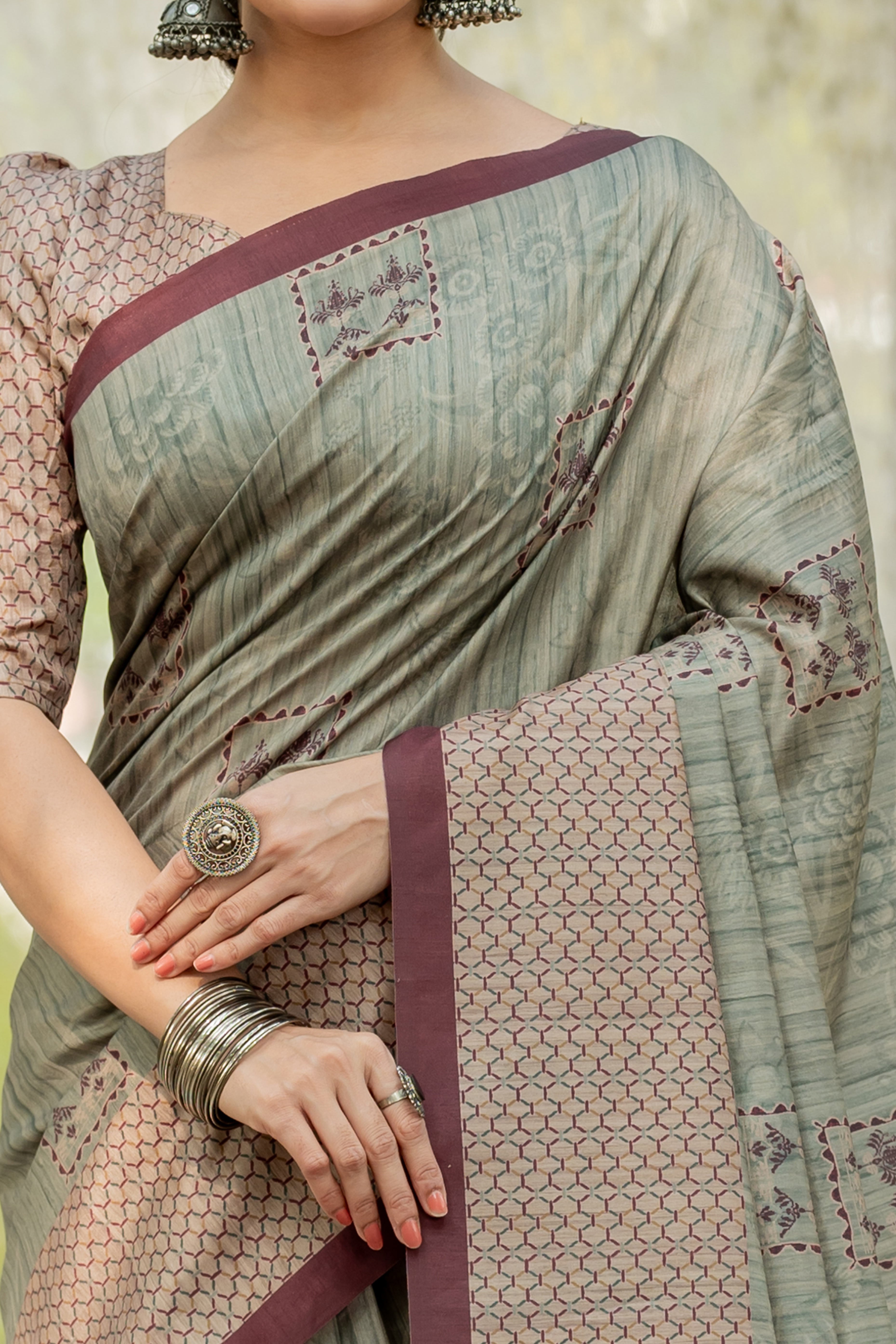 Sage Green Kozi Cotton Silk Saree Showcasing Digital Prints and Soft Tassel Edging