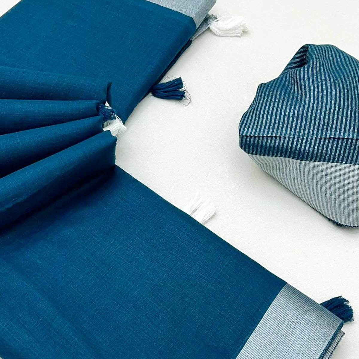 Blue Solid Pure Linen Saree With Zari Woven Border