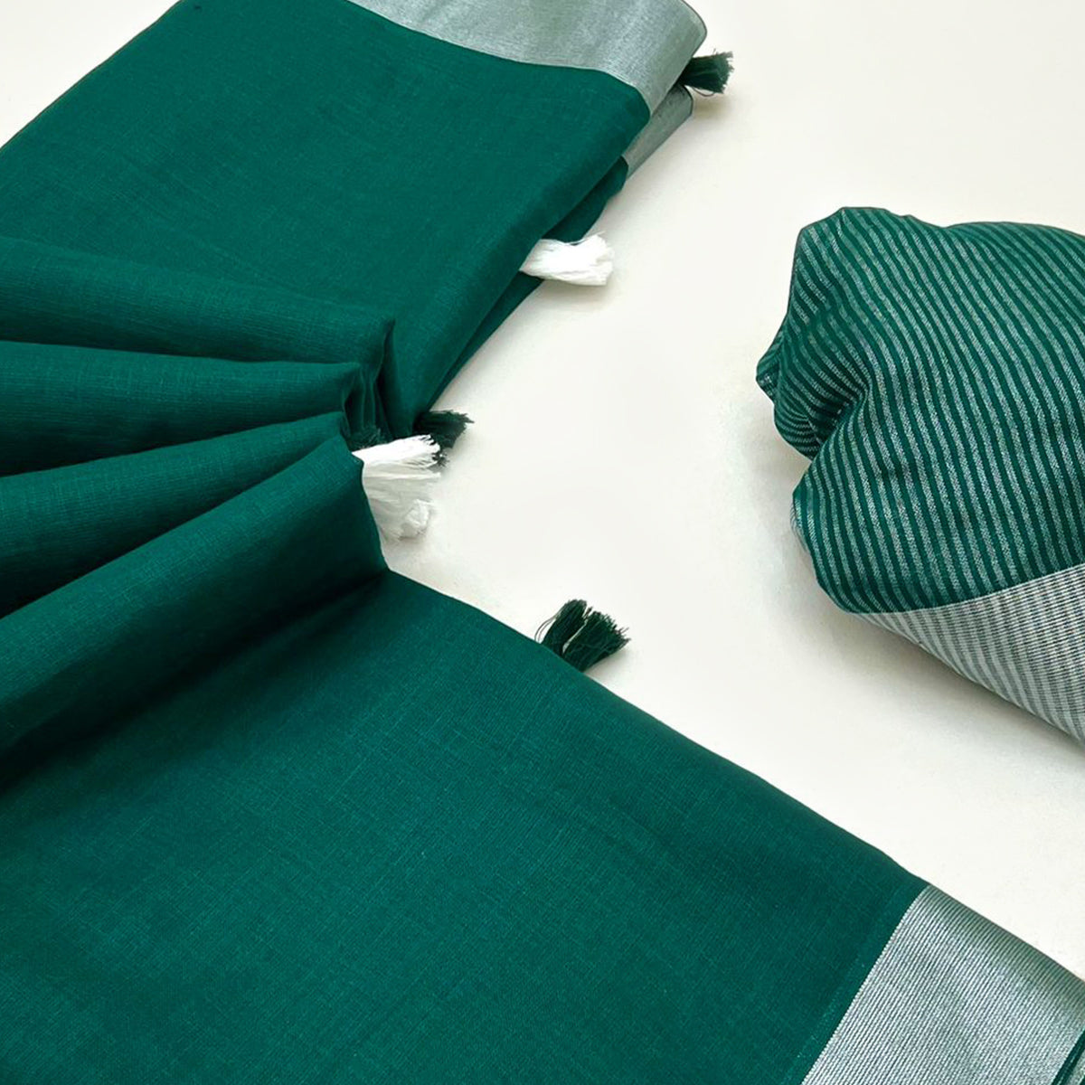 Green Solid Pure Linen Saree With Zari Woven Border
