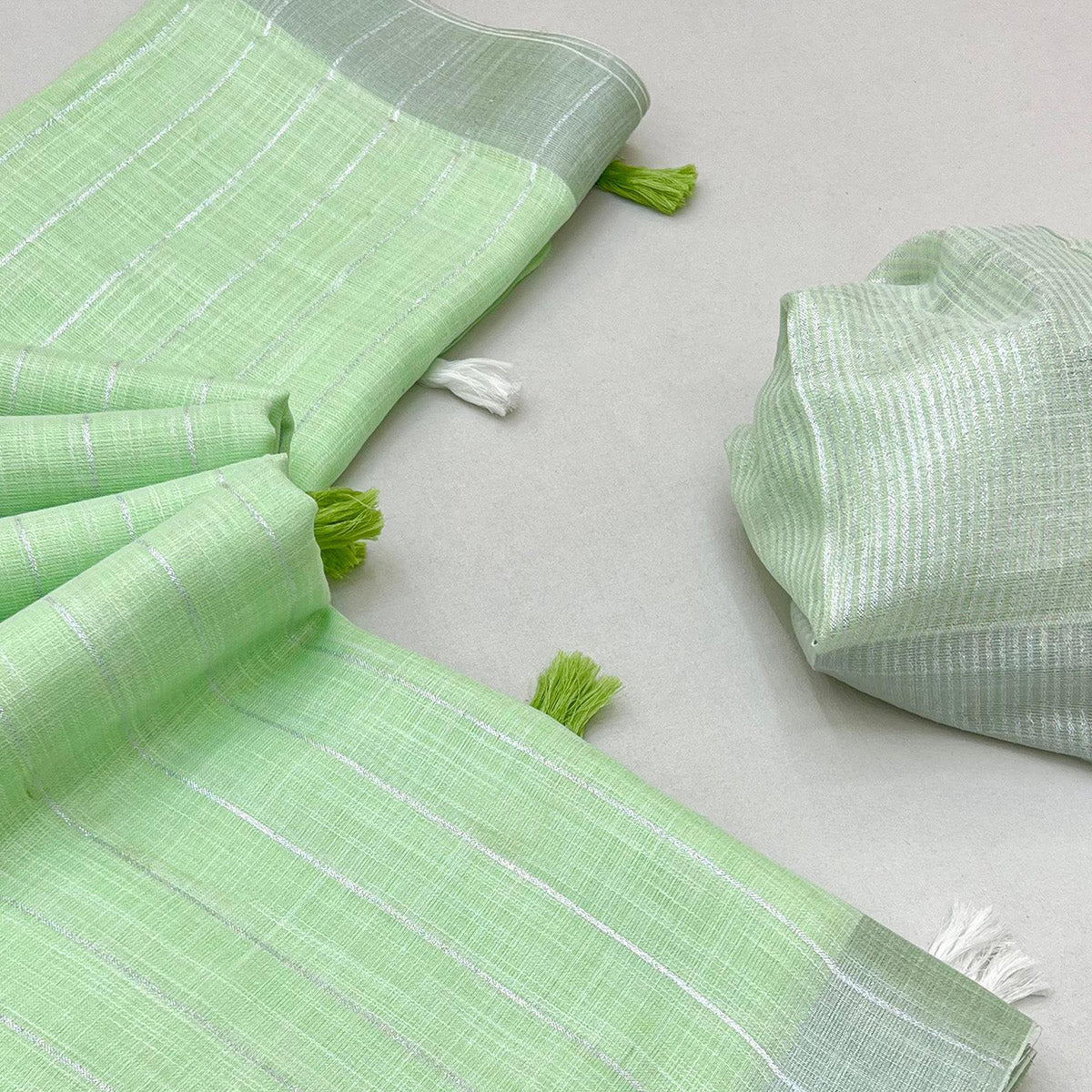 Green Zari Woven Linen Saree With Tassels