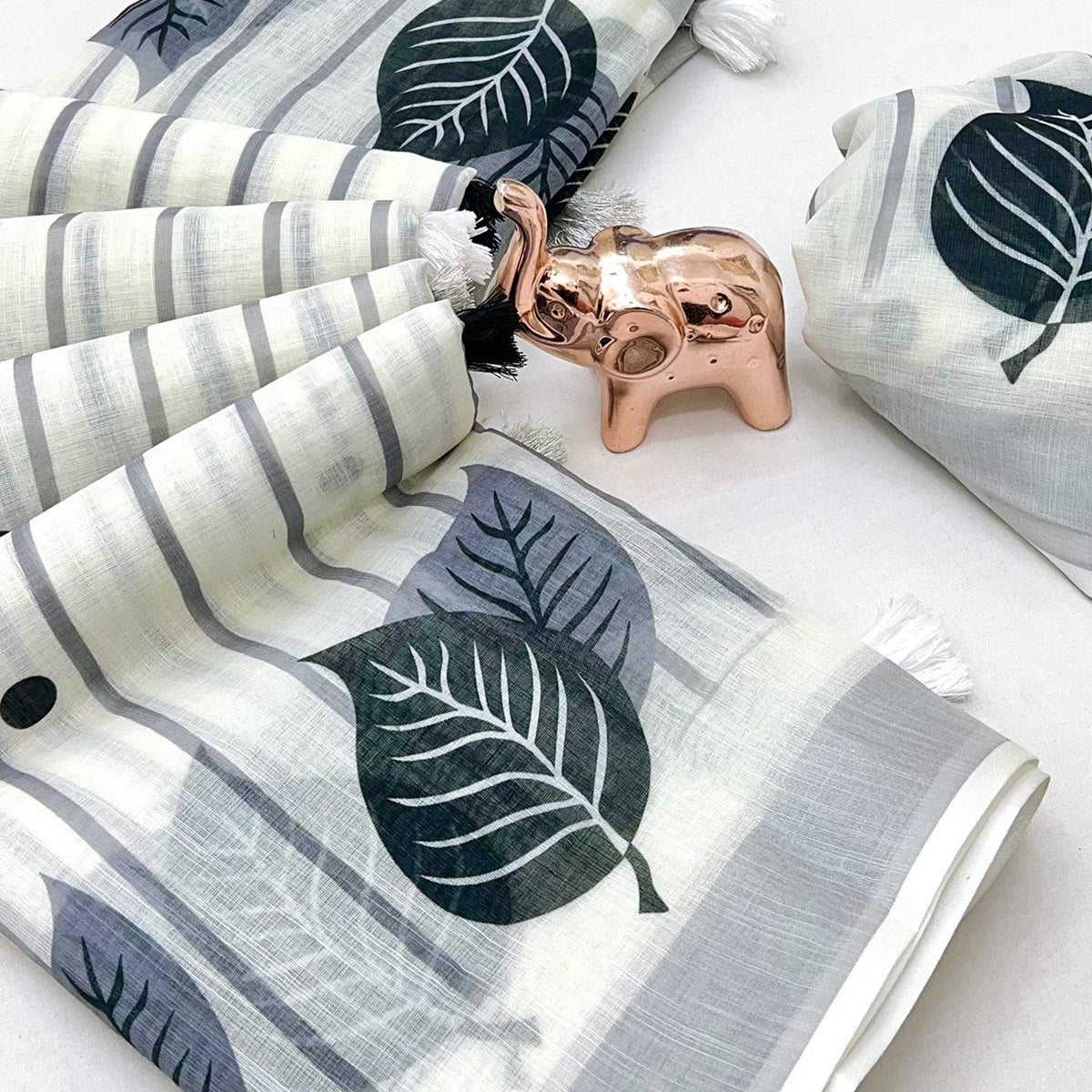 White Soft Linen Saree with Artistic Print Detailing