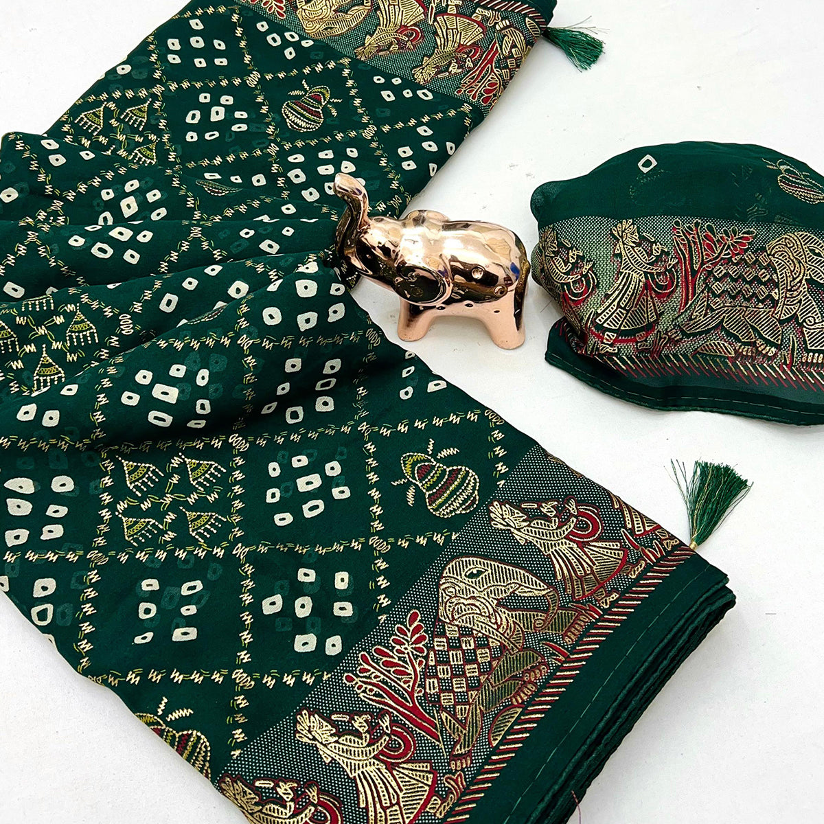 Elegant Bottle Green Bandhani Foil Printed Georgette Saree Highlighted With Soft Tassel Pallu