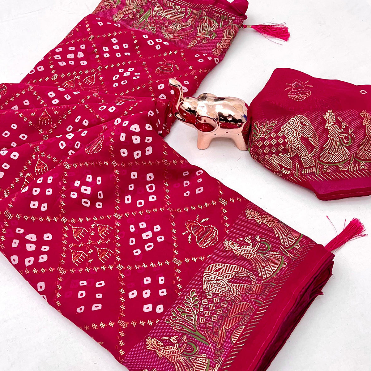 Elegant Pink Bandhani Foil Printed Georgette Saree Highlighted With Soft Tassel Pallu