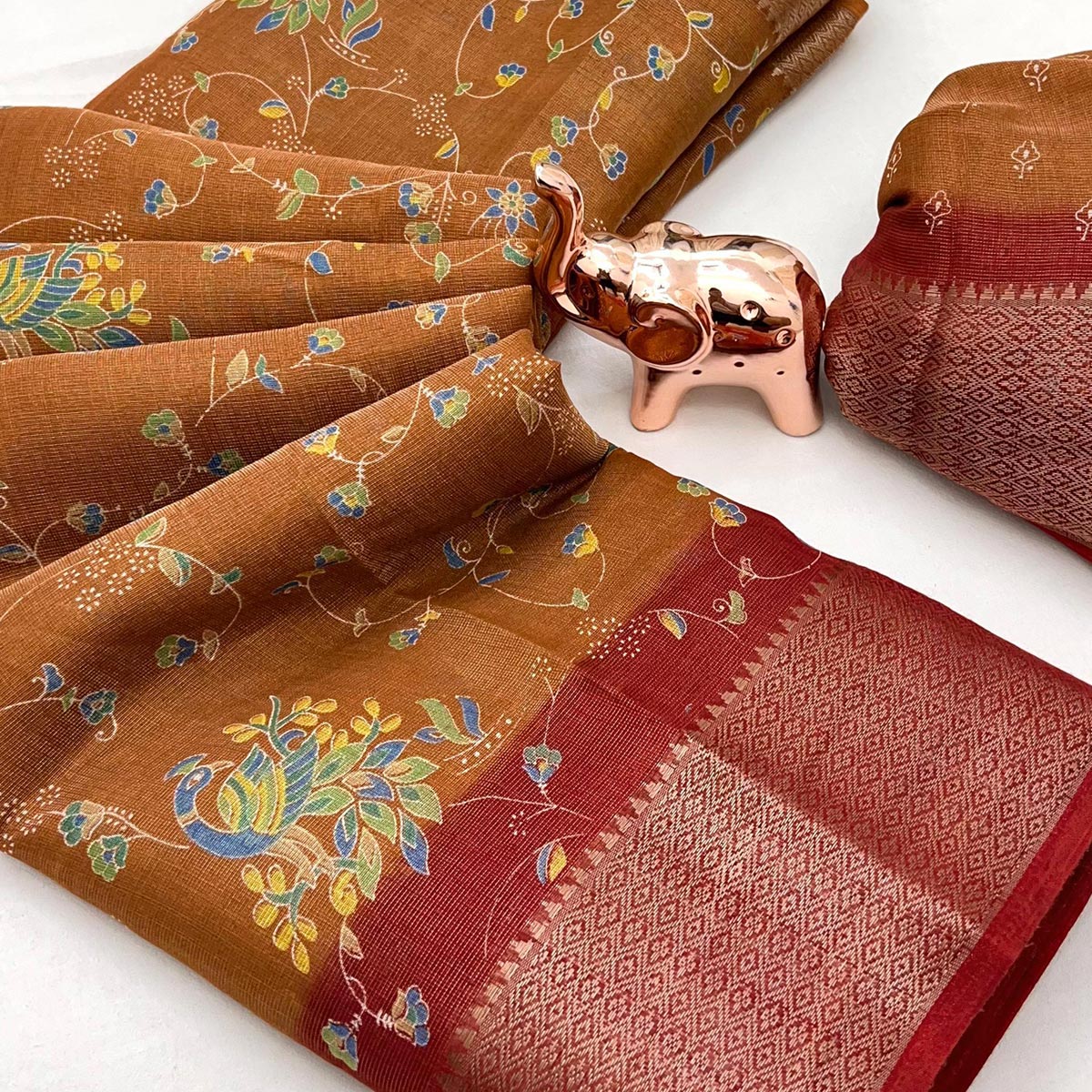 Rust Floral Printed Cotton Blend Saree With Zari Woven Border