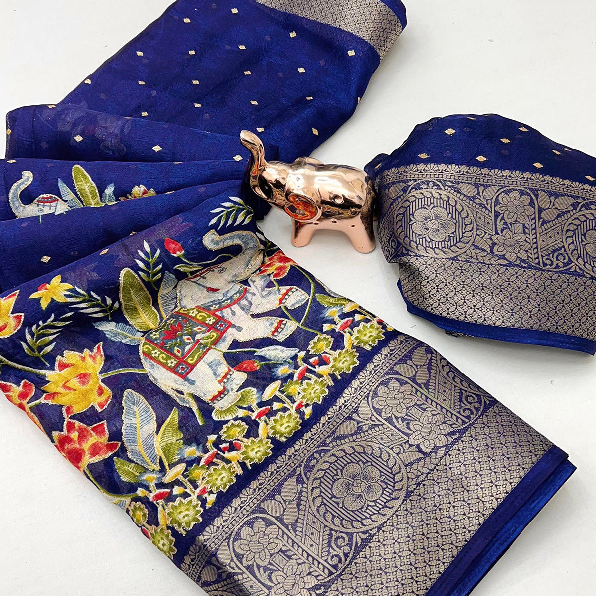 Elegant Navy Blue Elephant & Floral Printed Georgette Saree Accented With Weaving Zari Border