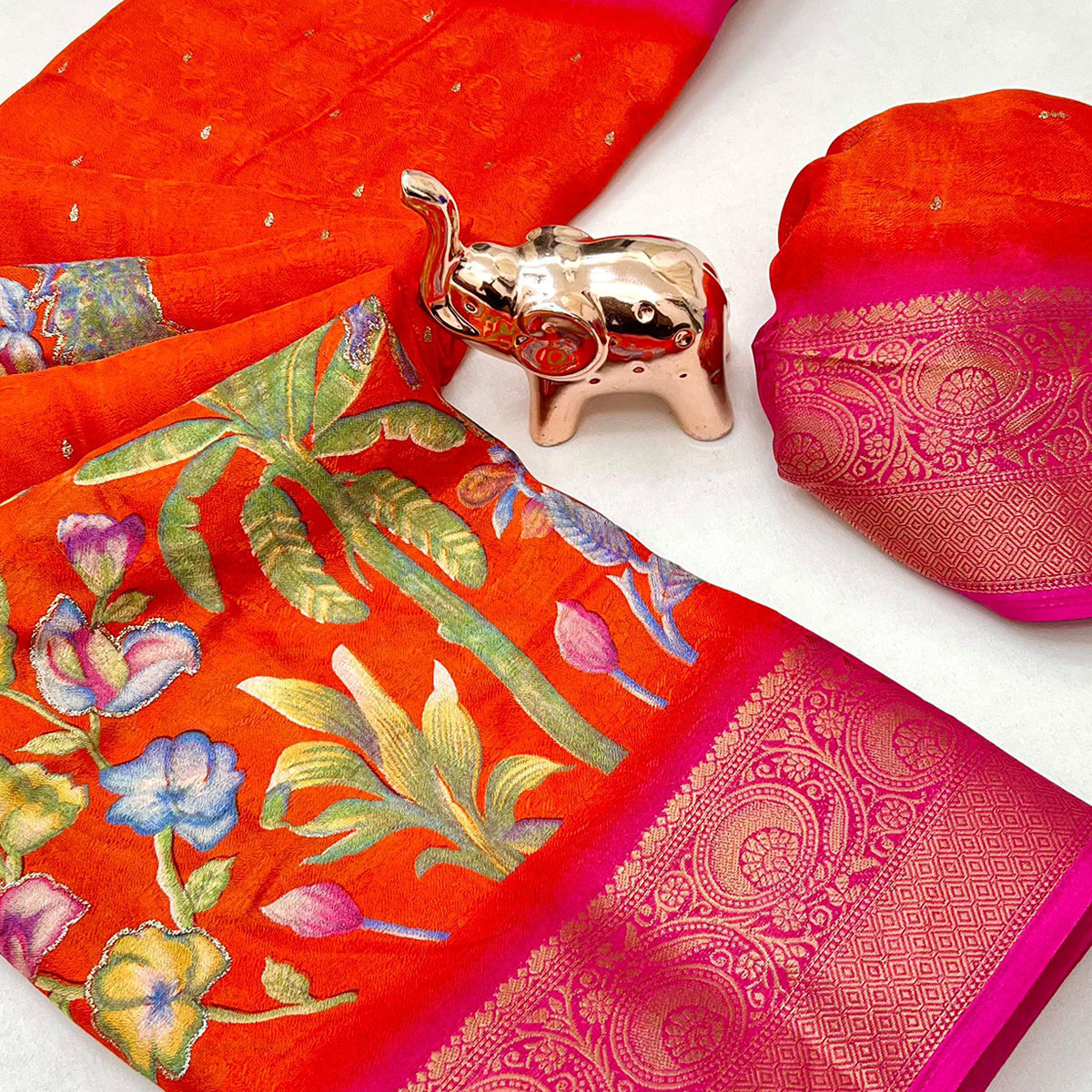 Elegant Orange Peacock & Floral Printed Georgette Saree Accented With Gleaming Weaving Zari Border