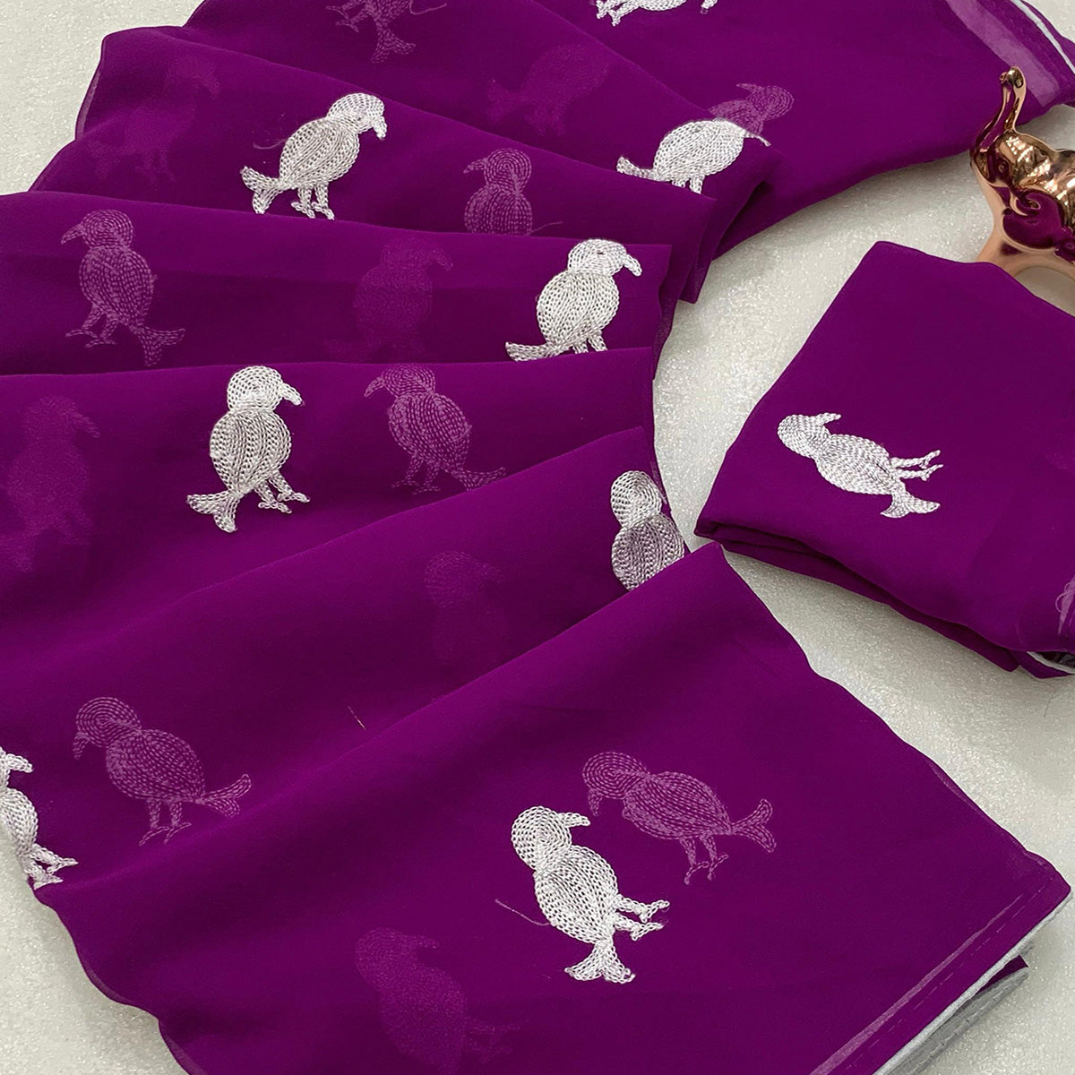 Dark Purple Georgette Saree Adorned With Elegant Bird Embroidery