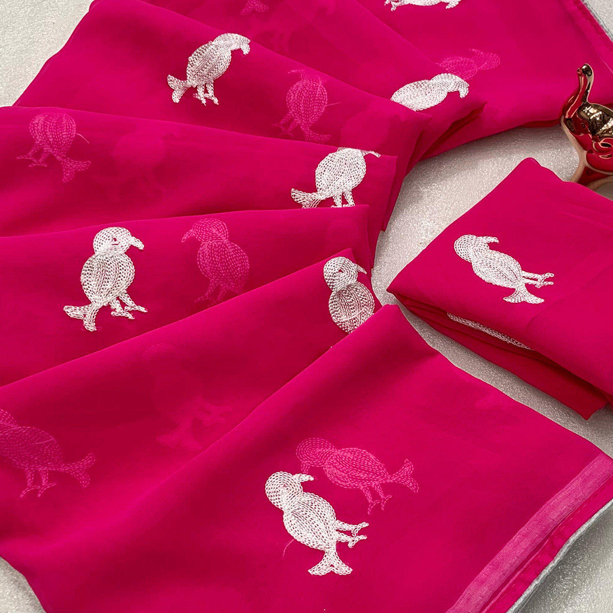 Pink Georgette Saree Adorned With Elegant Bird Embroidery